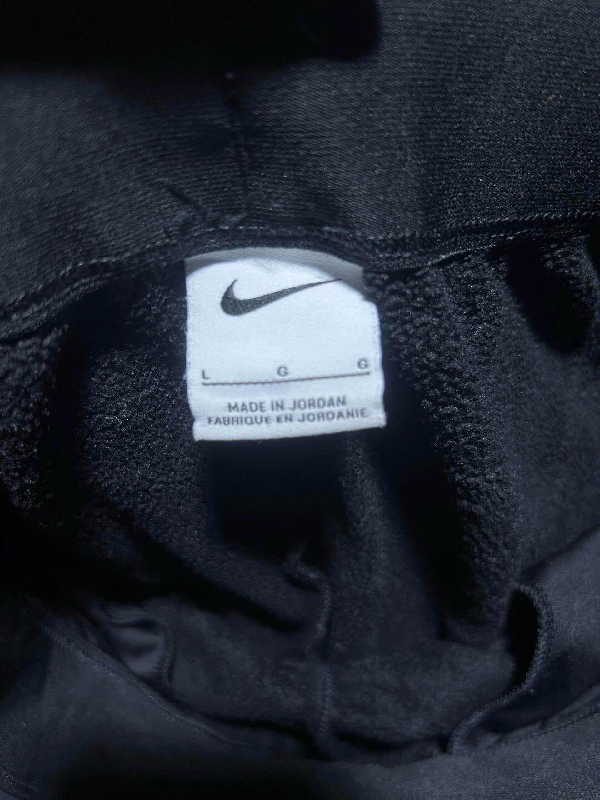 Nike thrift track pants India close-up