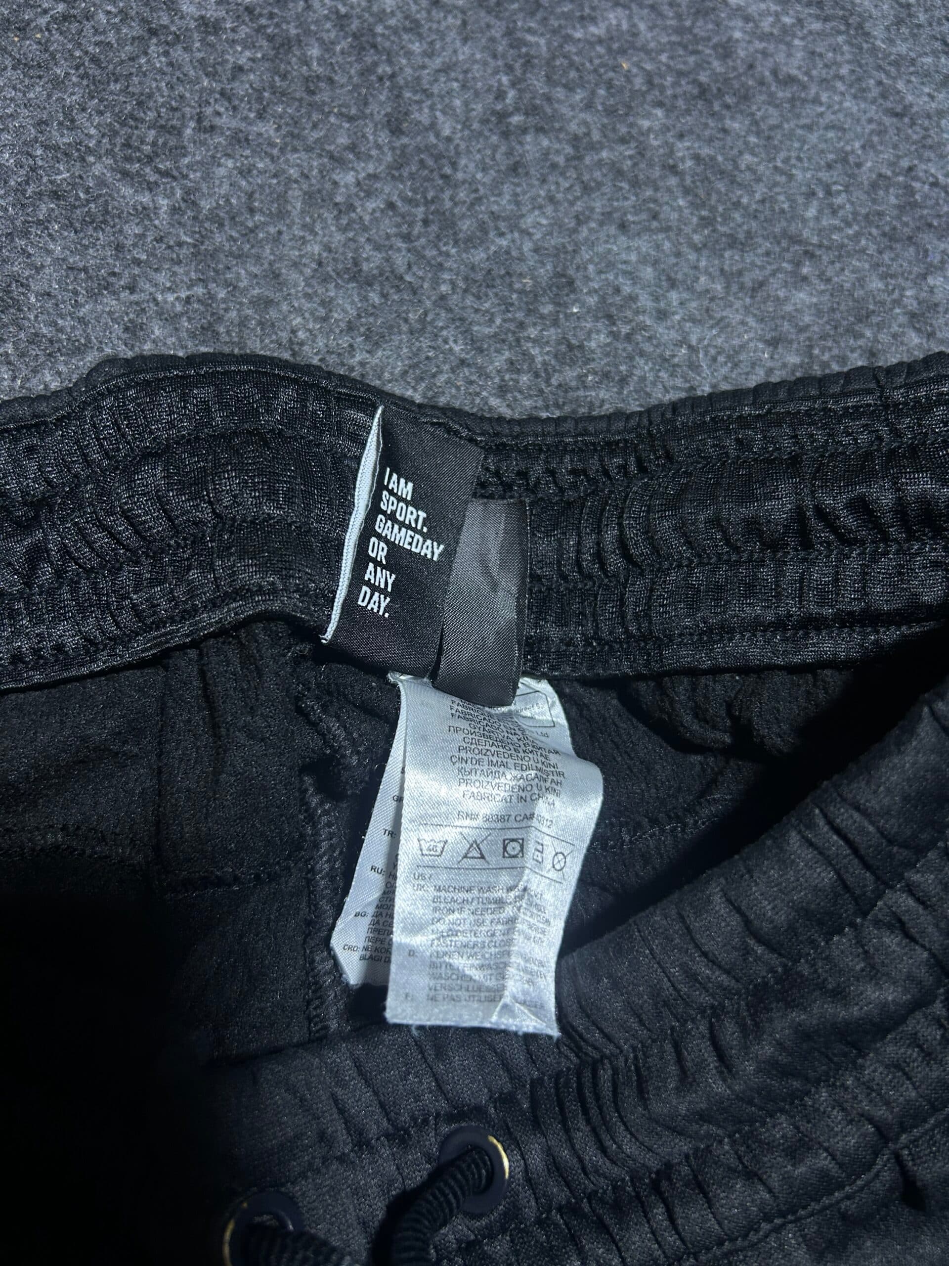 Adidas thrift track pants India close-up