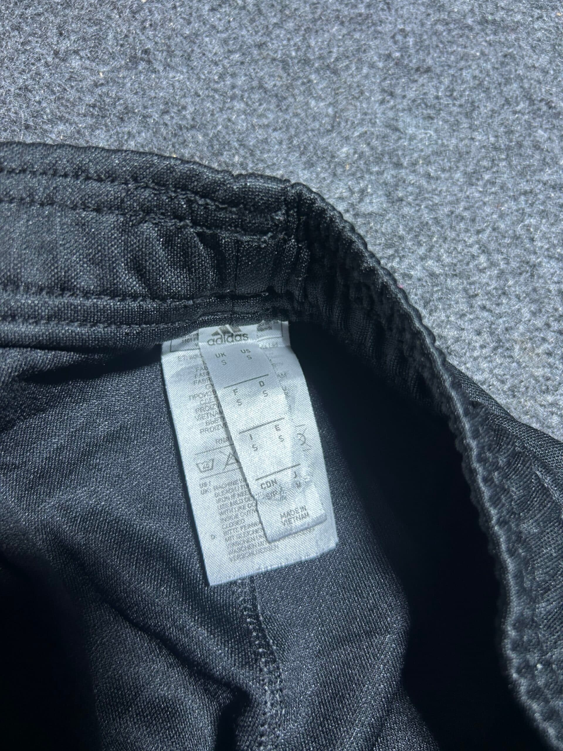 Adidas thrift track pants India close-up