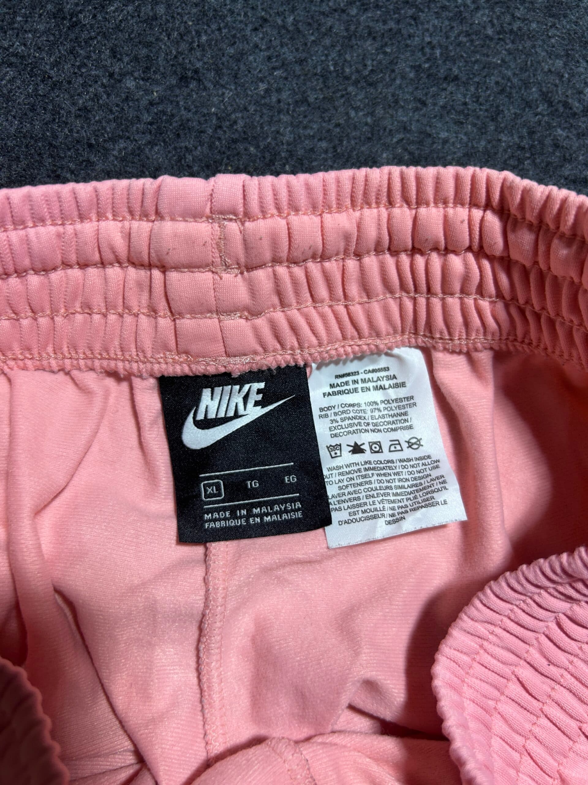 Nike thrift track pants India close-up