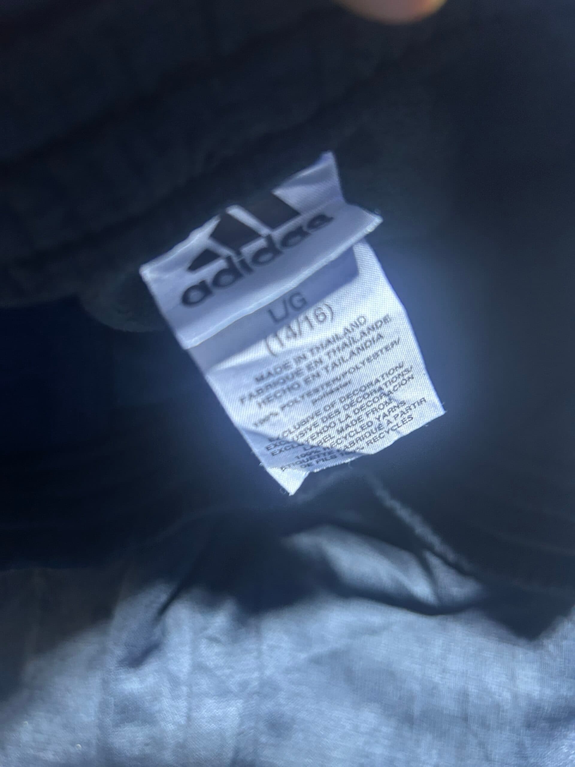 Adidas thrift track pants India close-up