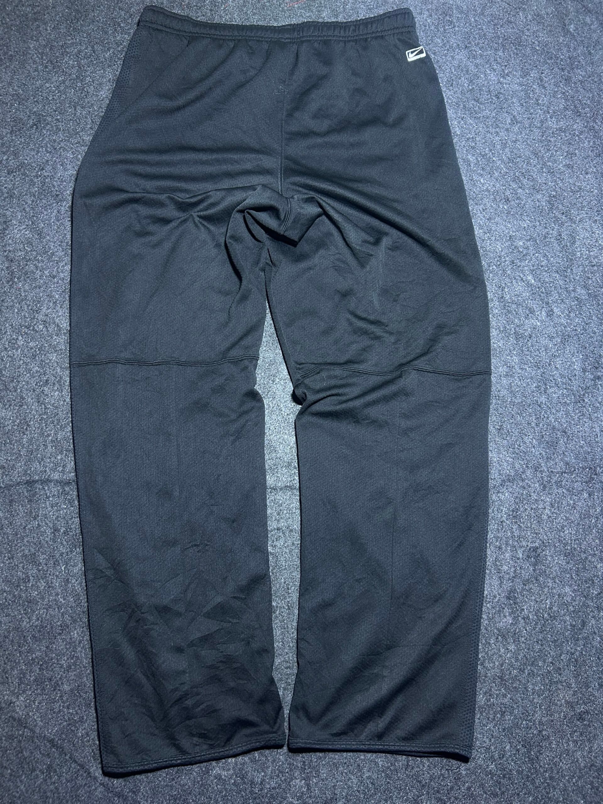 Nike thrift track pants India back view