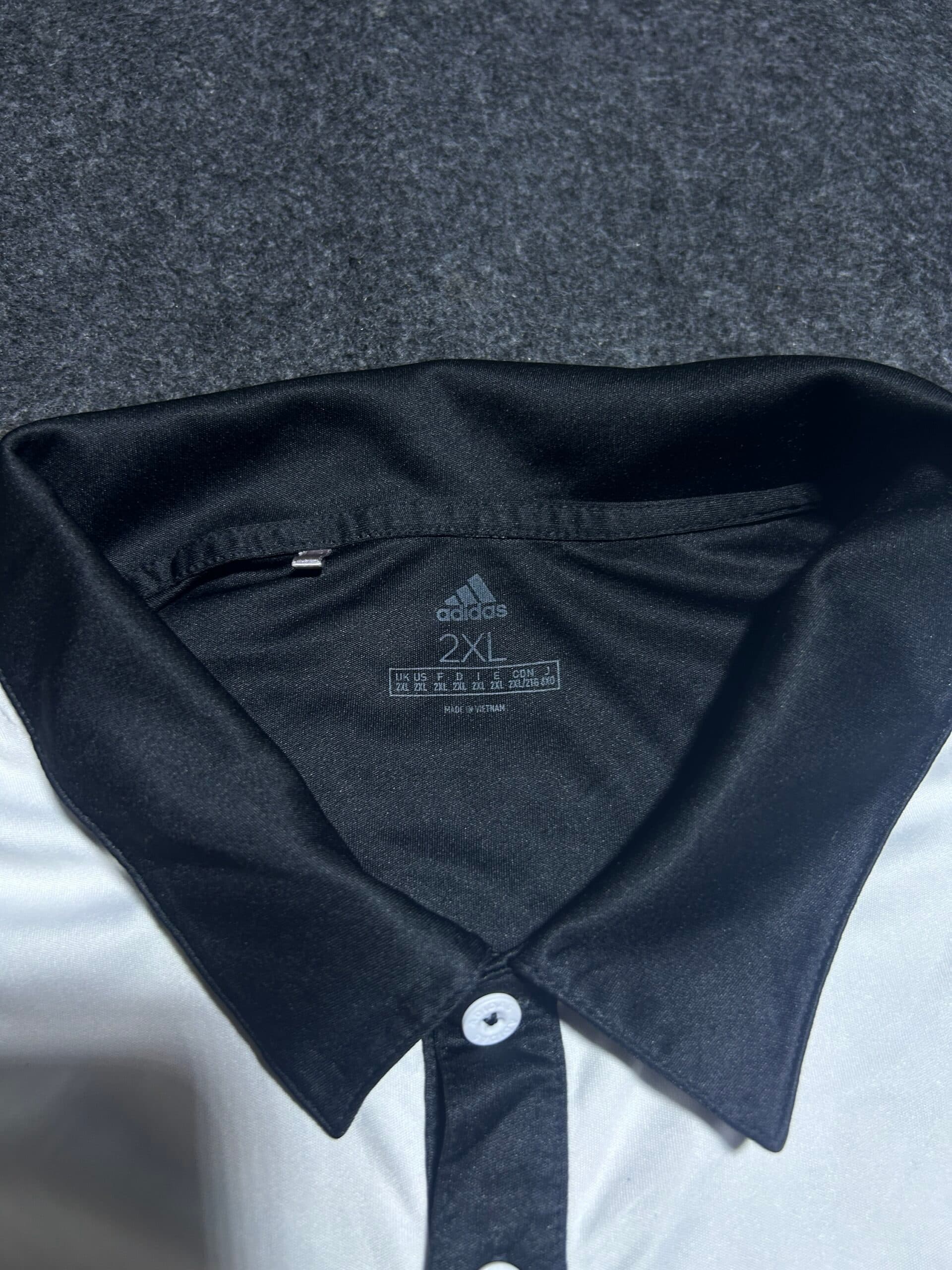 Adidas thrift polo shirt India close-up