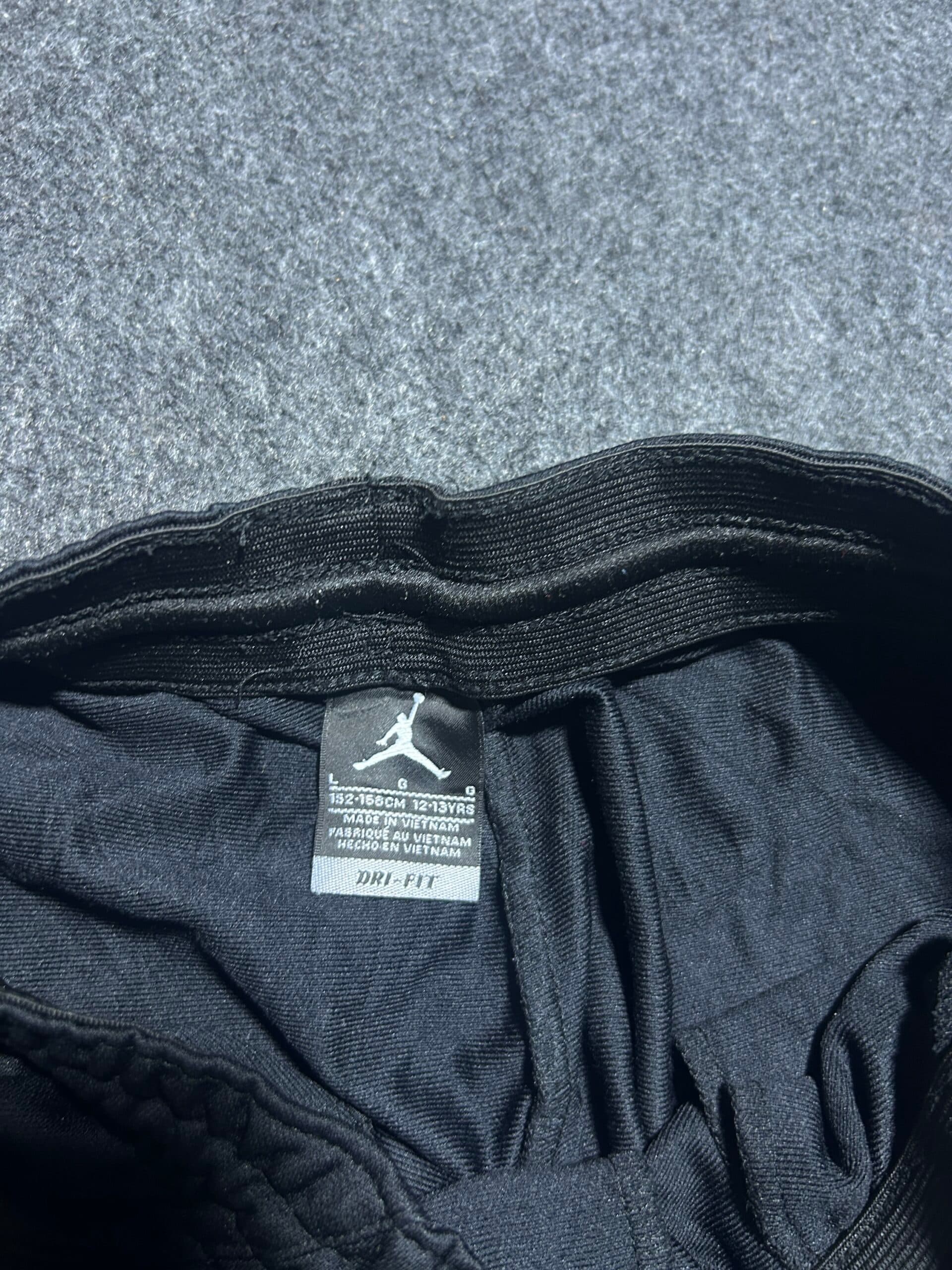 Branded thrift track pants India close-up