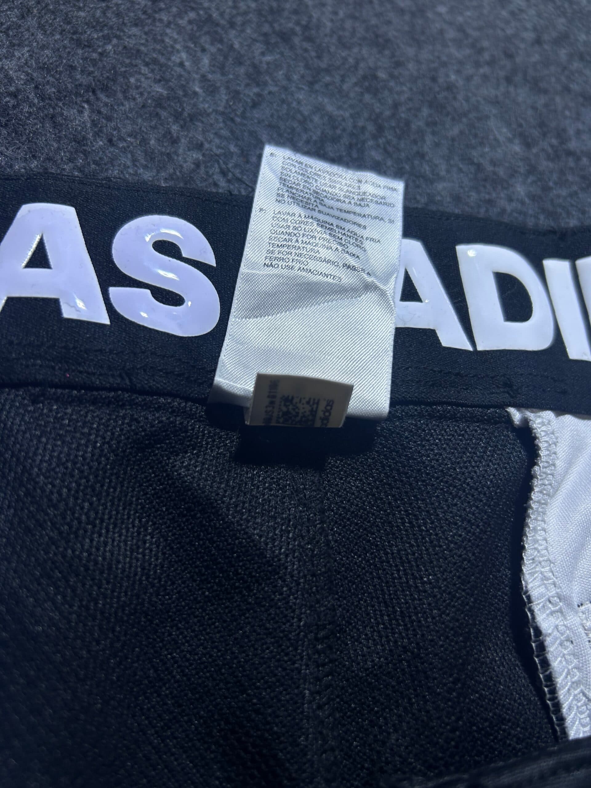Adidas thrift shorts India close-up