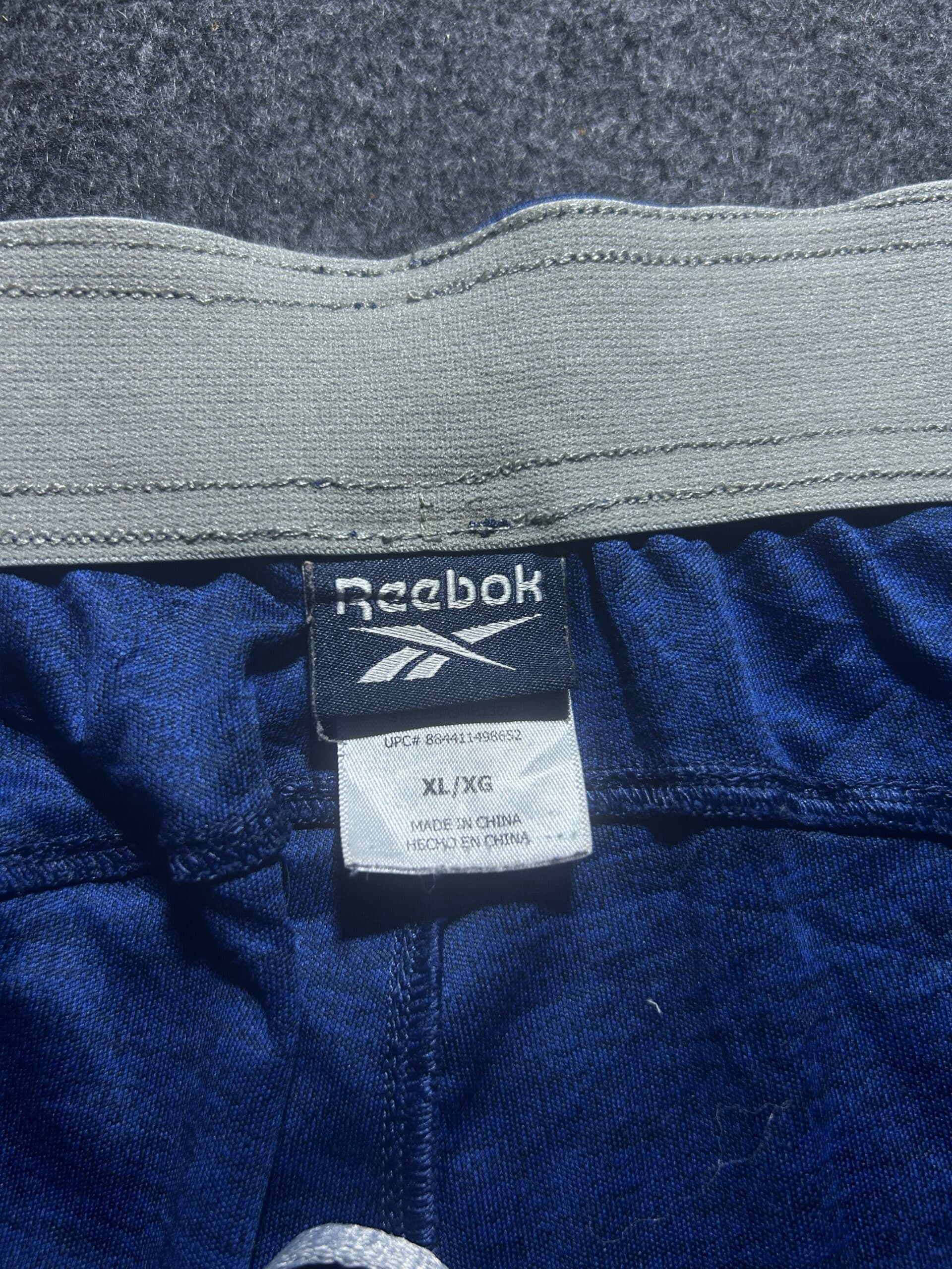 Reebok thrift shorts India close-up