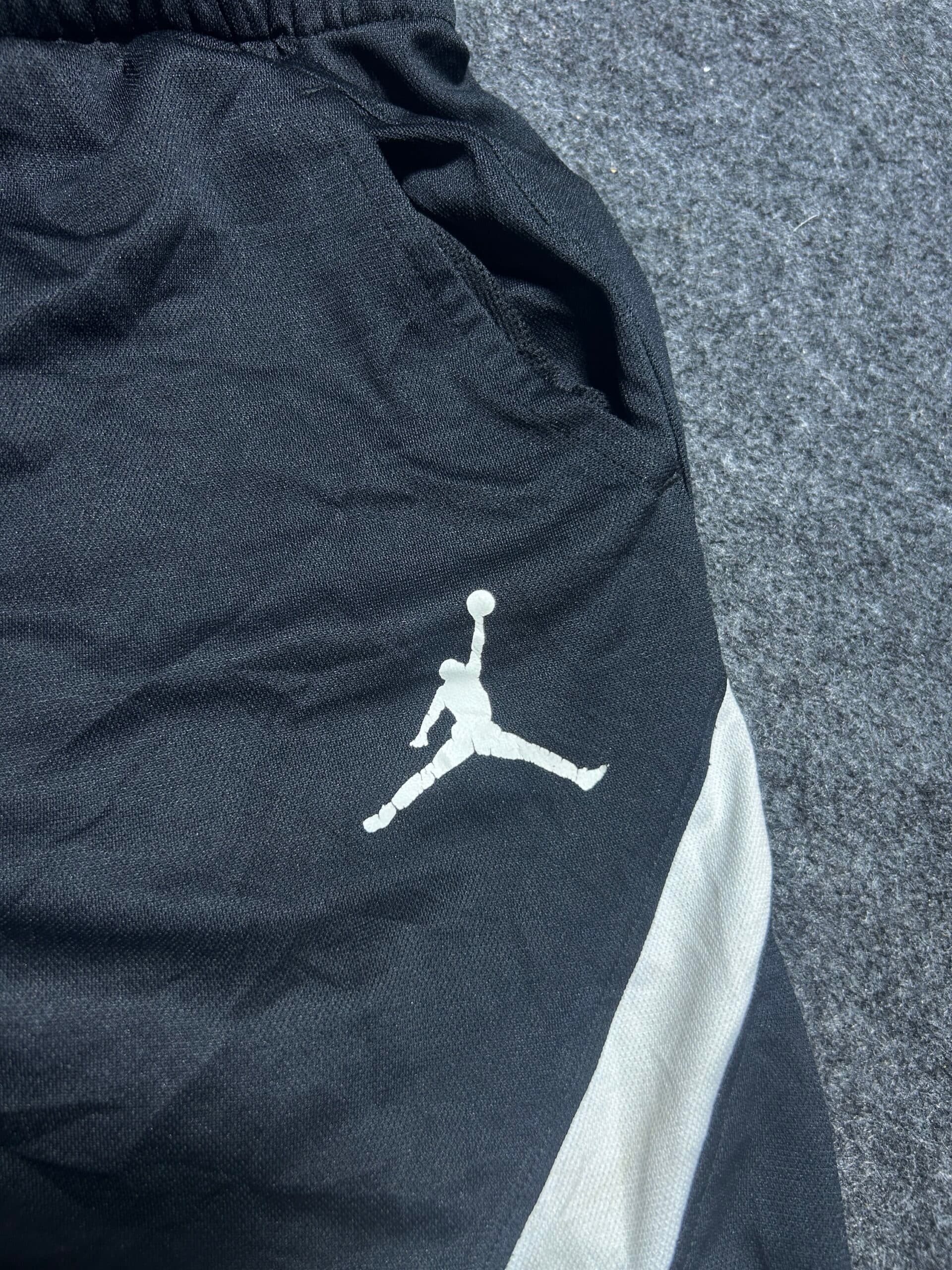 Branded thrift track pants India close-up
