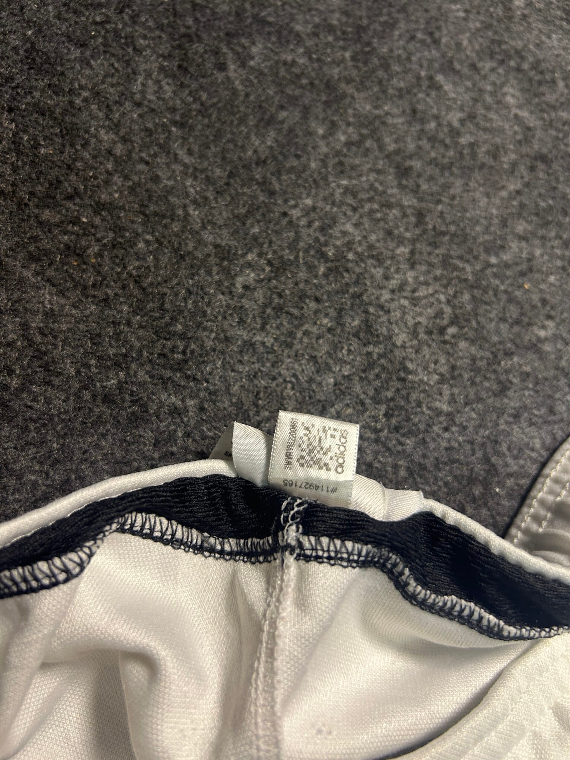 Adidas thrift track pants India close-up
