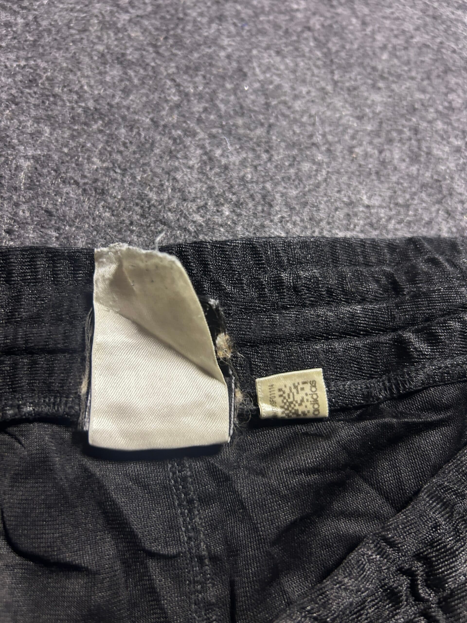 Adidas thrift shorts India close-up