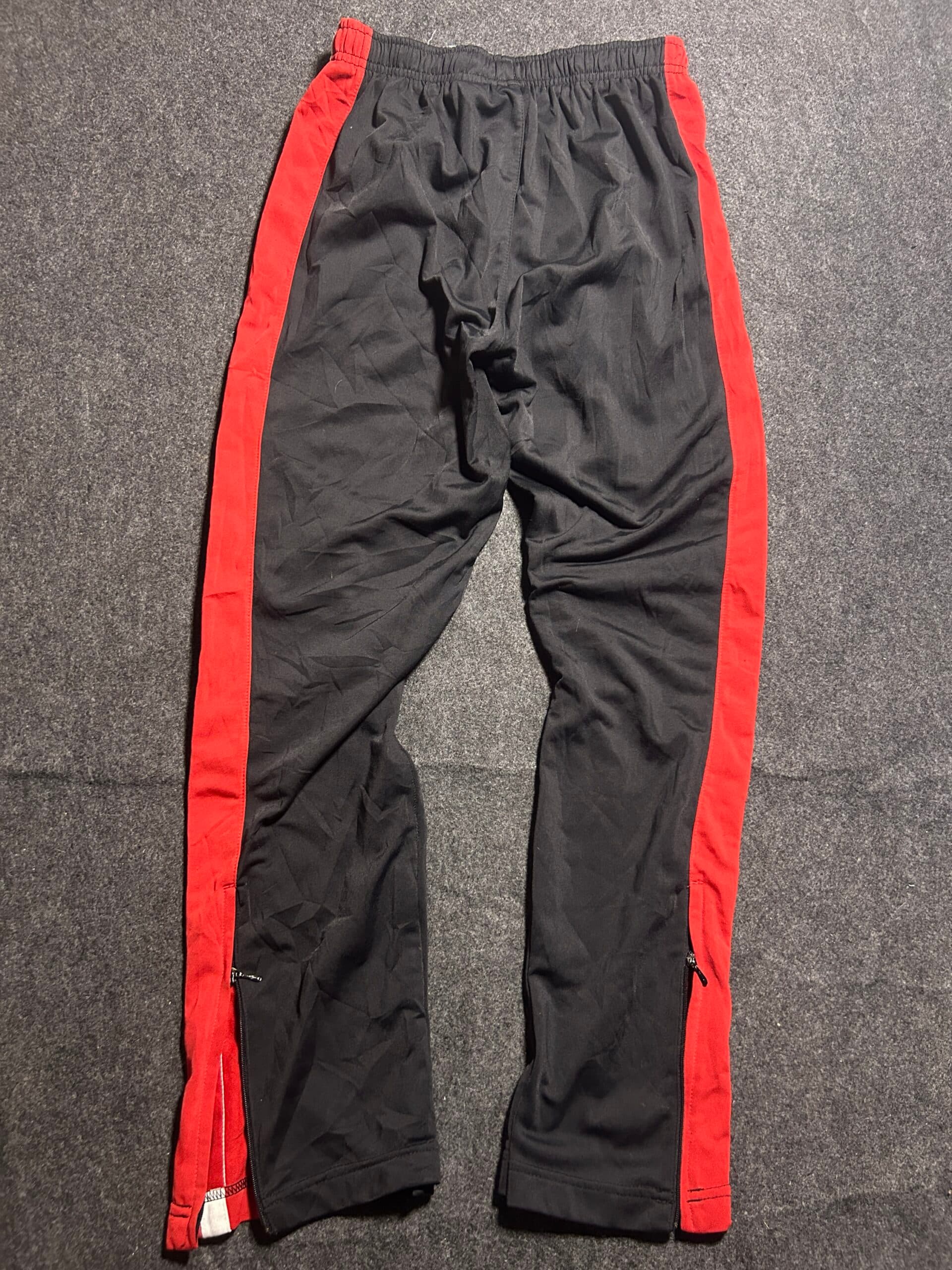 Nike thrift track pants India close-up