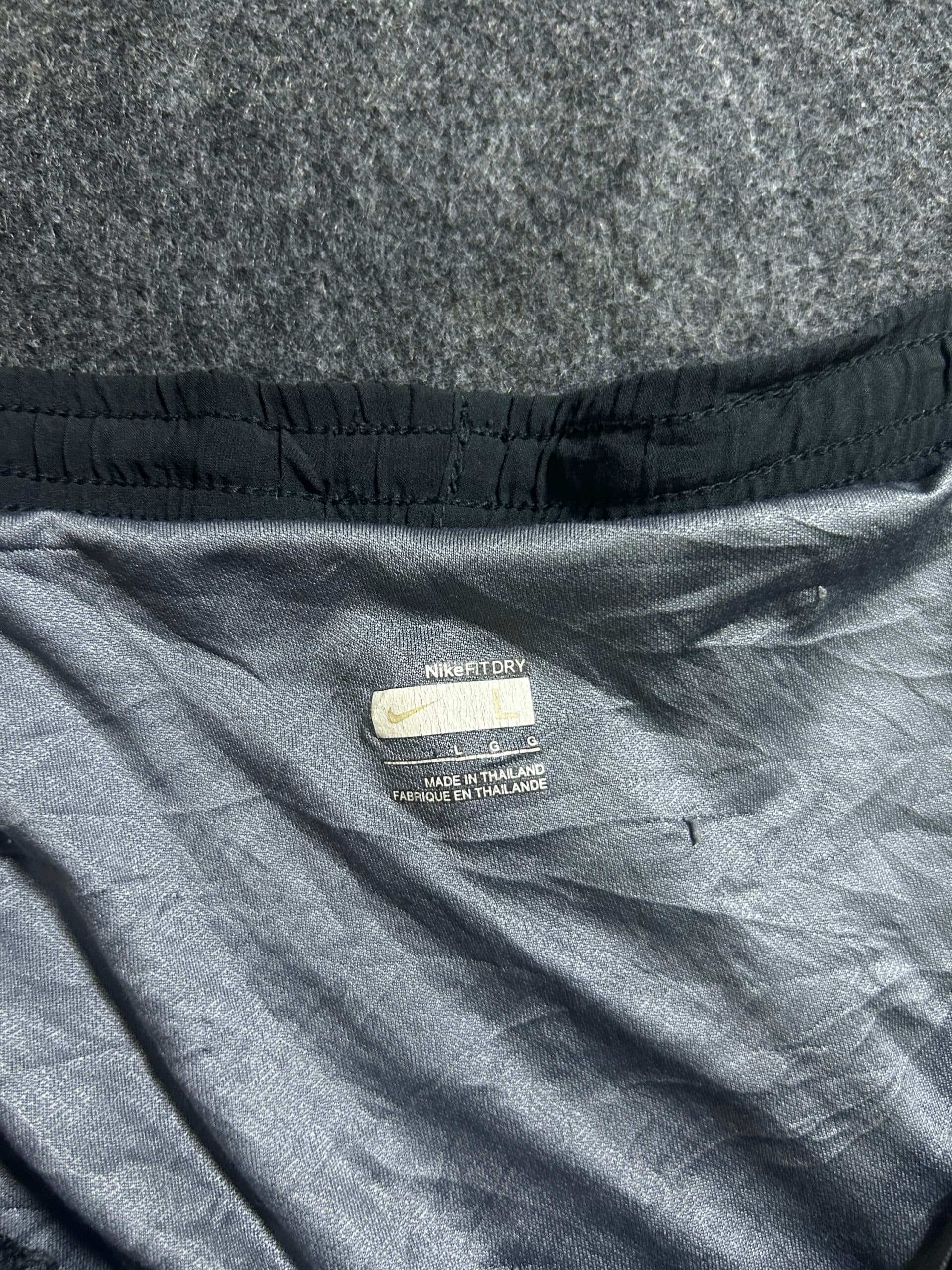 Nike thrift shorts India close-up
