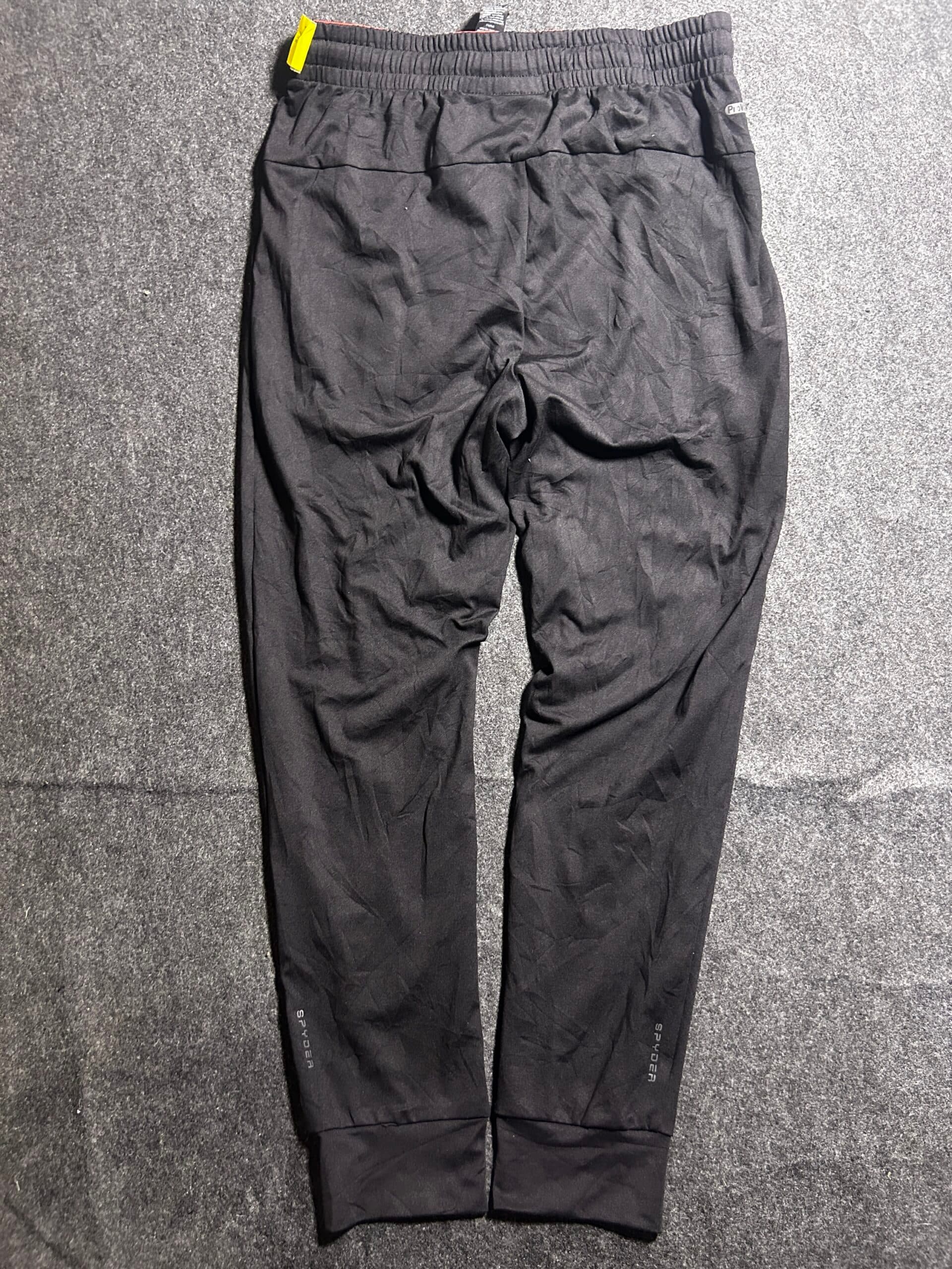 Branded thrift track pants India close-up