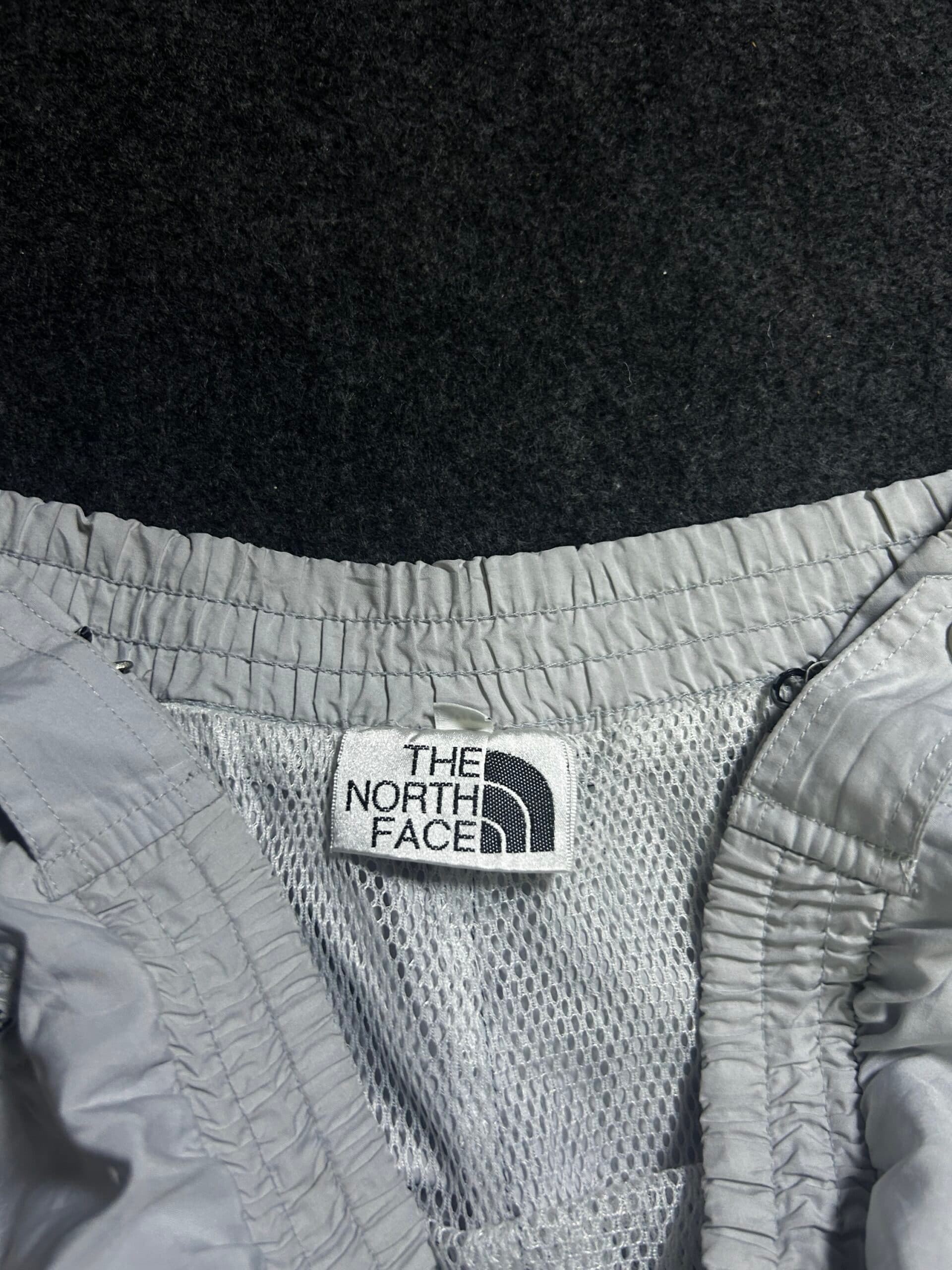The North Face thrift windbreaker jacket India detail view