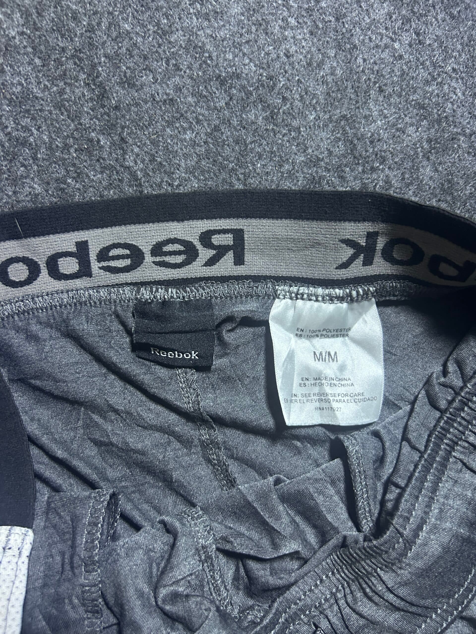 Reebok thrift shorts India close-up
