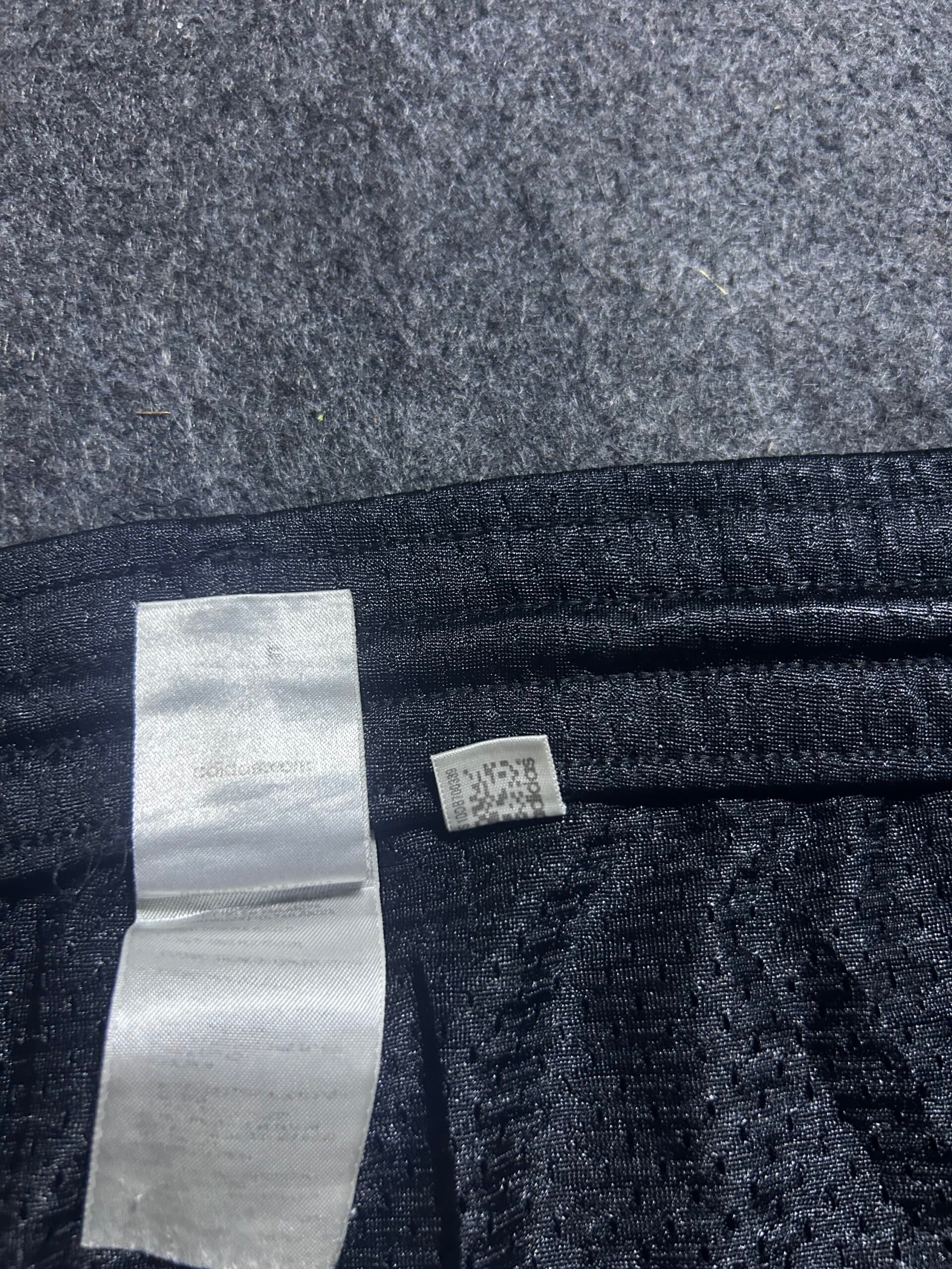 Adidas thrift shorts India close-up