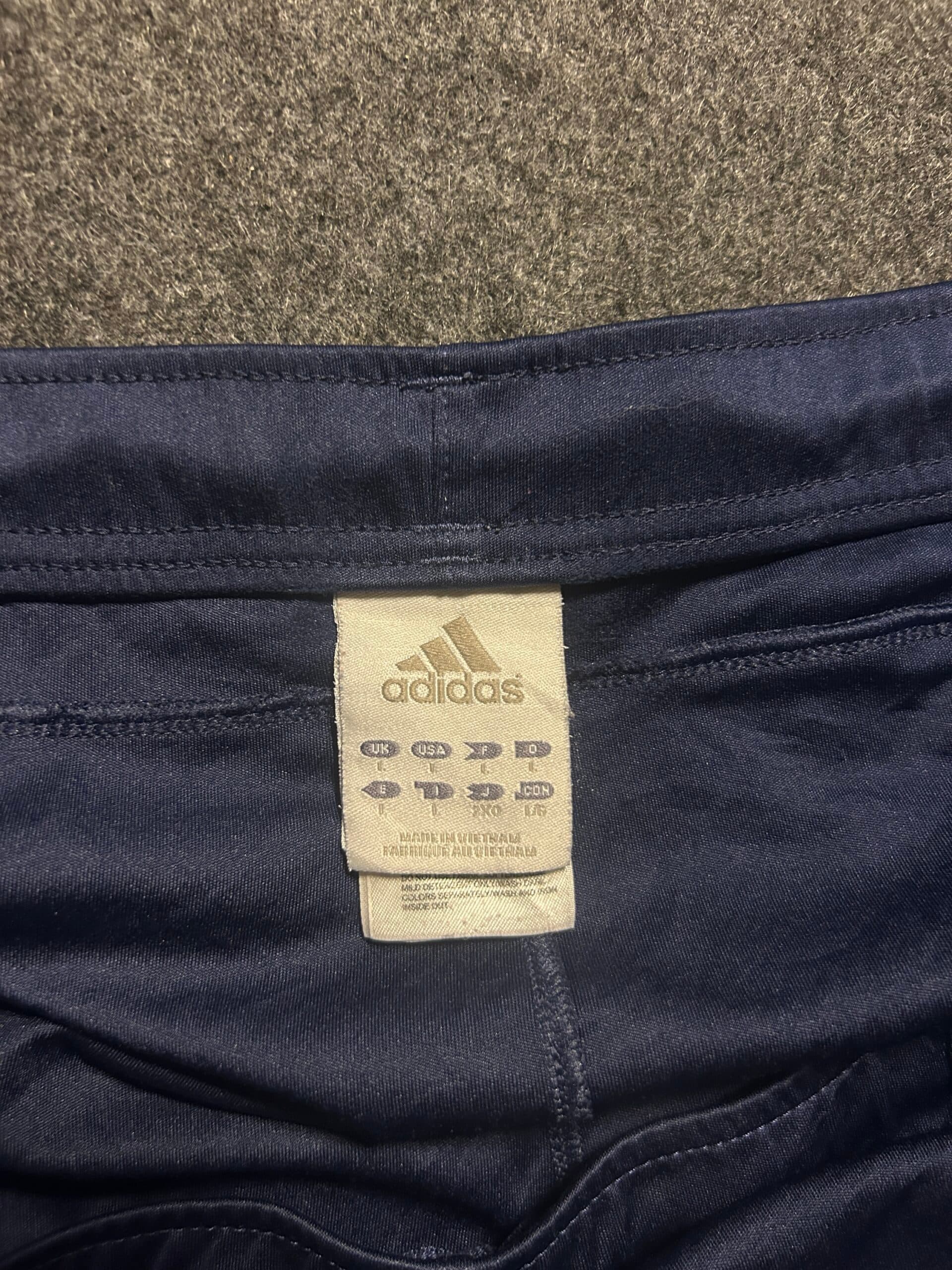 Adidas thrift shorts India close-up