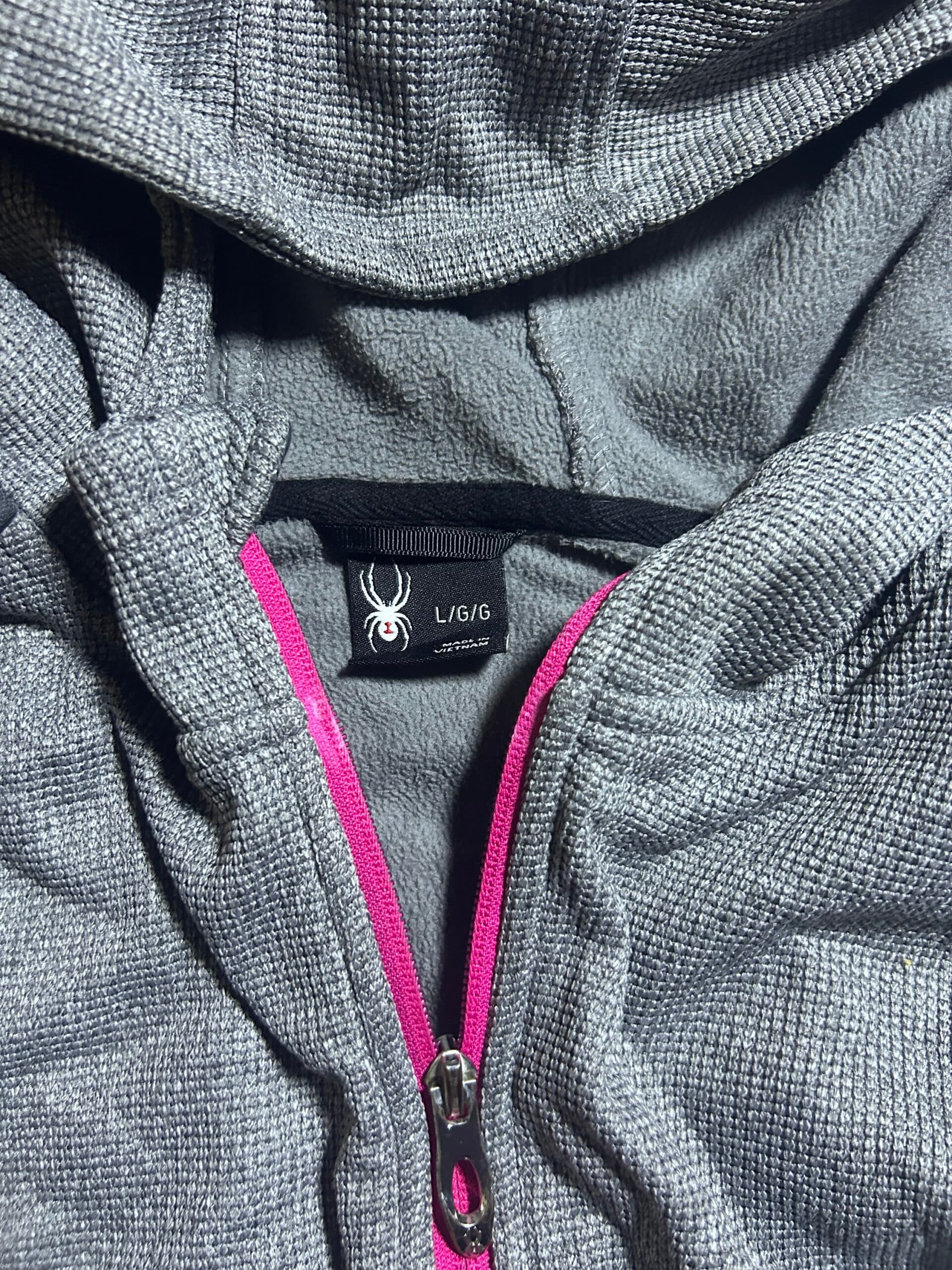 Branded thrift fleece jacket India close-up