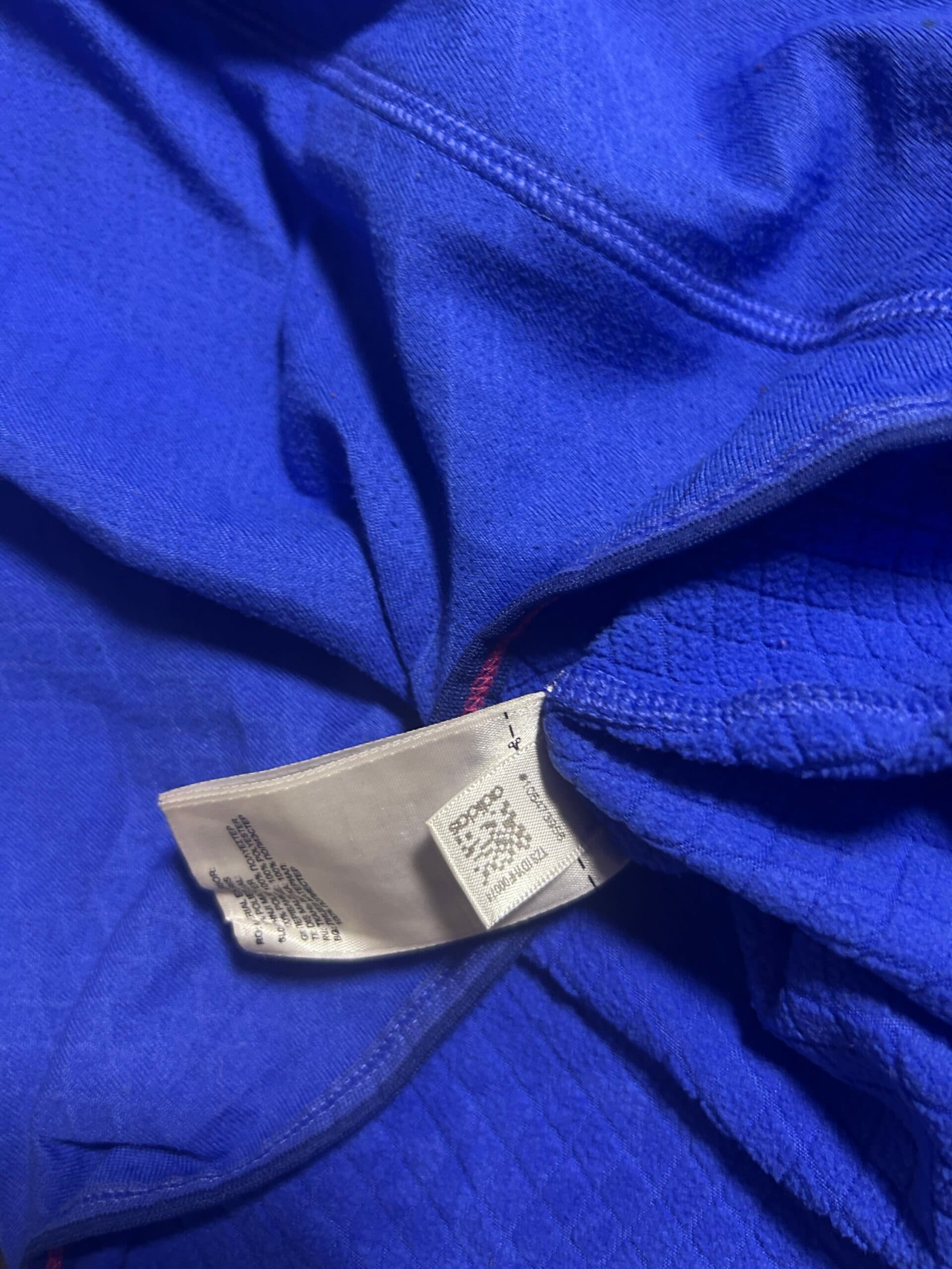 Adidas thrift fleece jacket India close-up