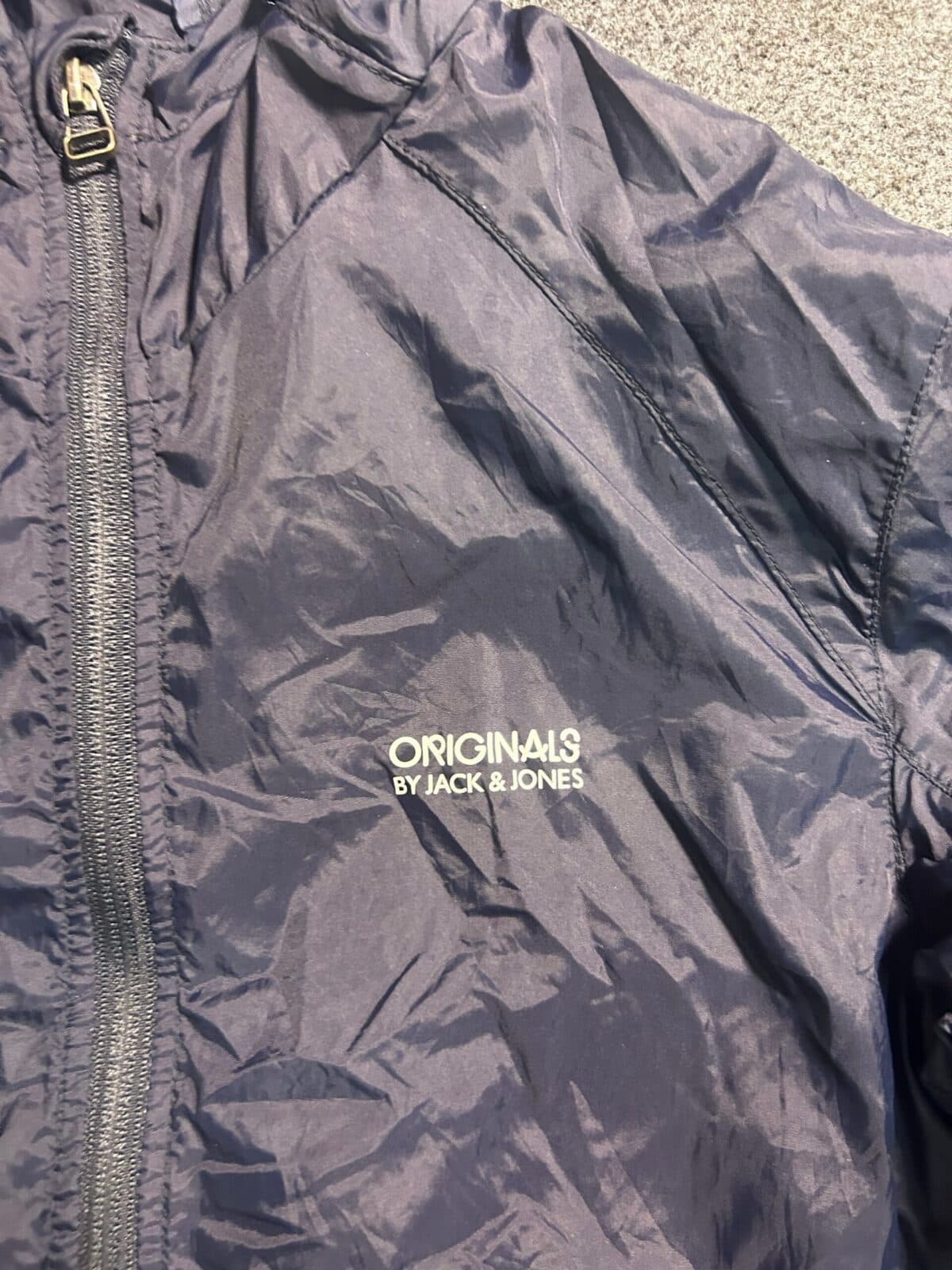 Branded thrift windbreaker jacket India detail view