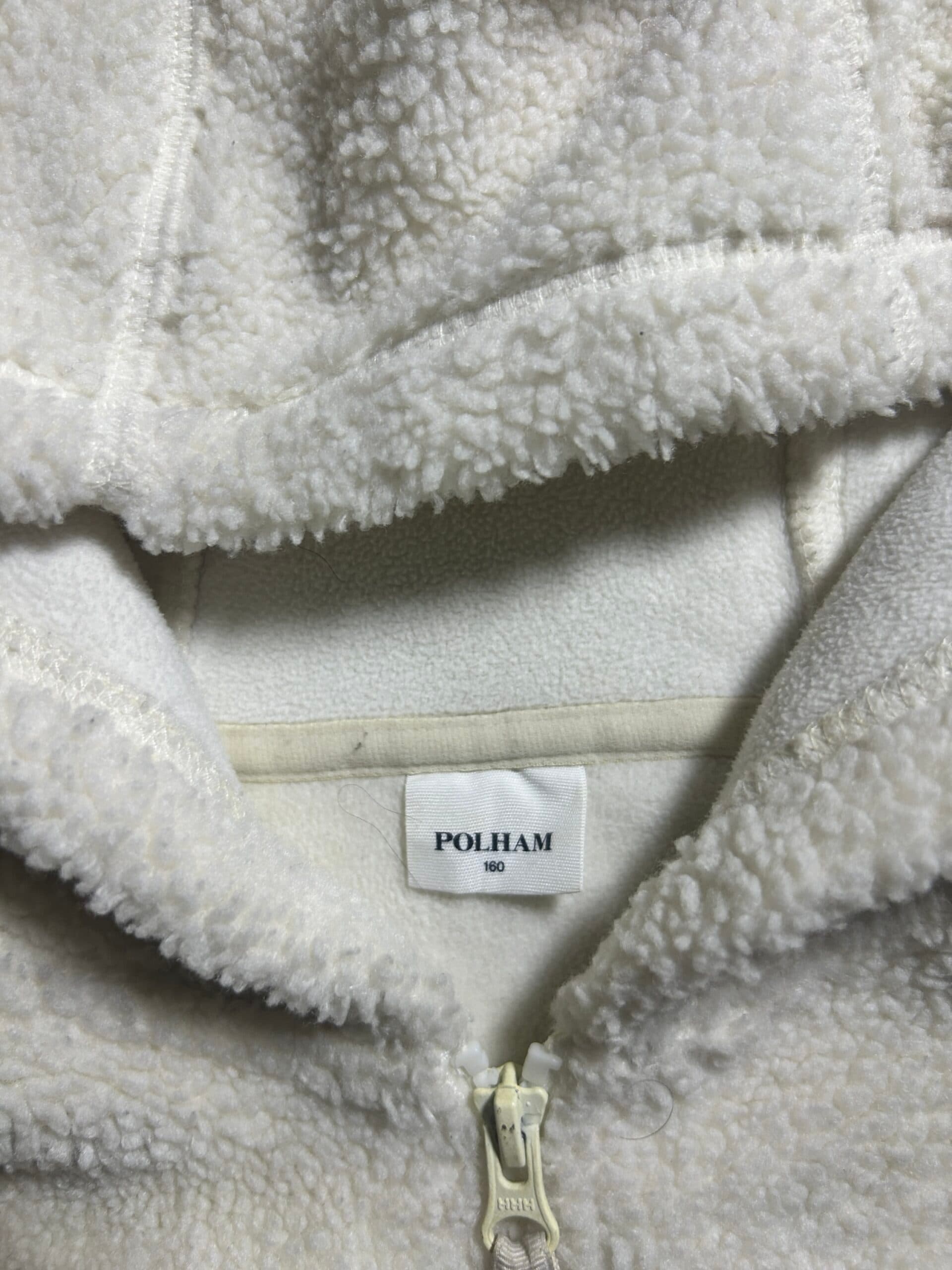 Branded thrift fleece jacket India close-up