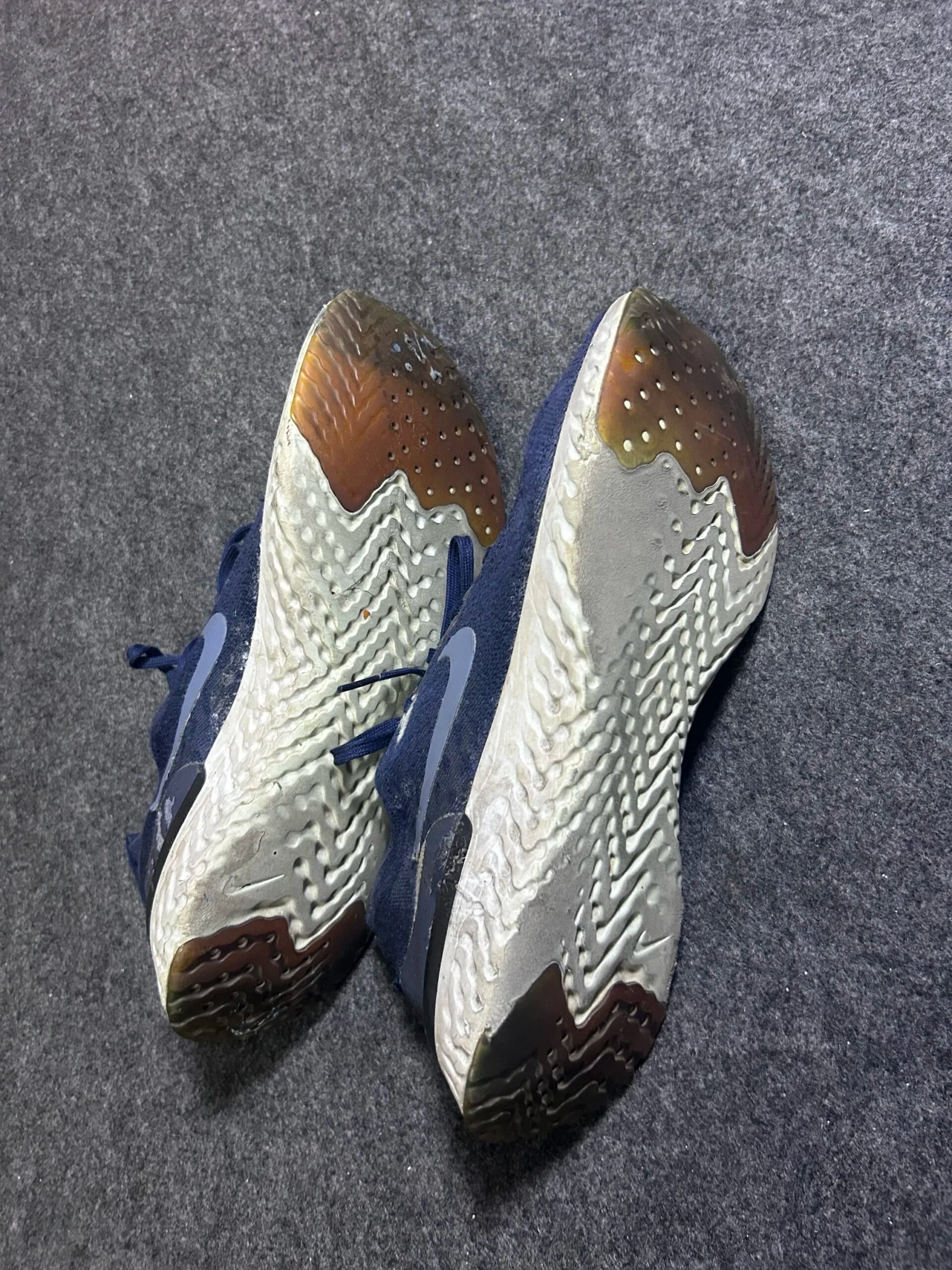 Nike thrift running shoes India close-up