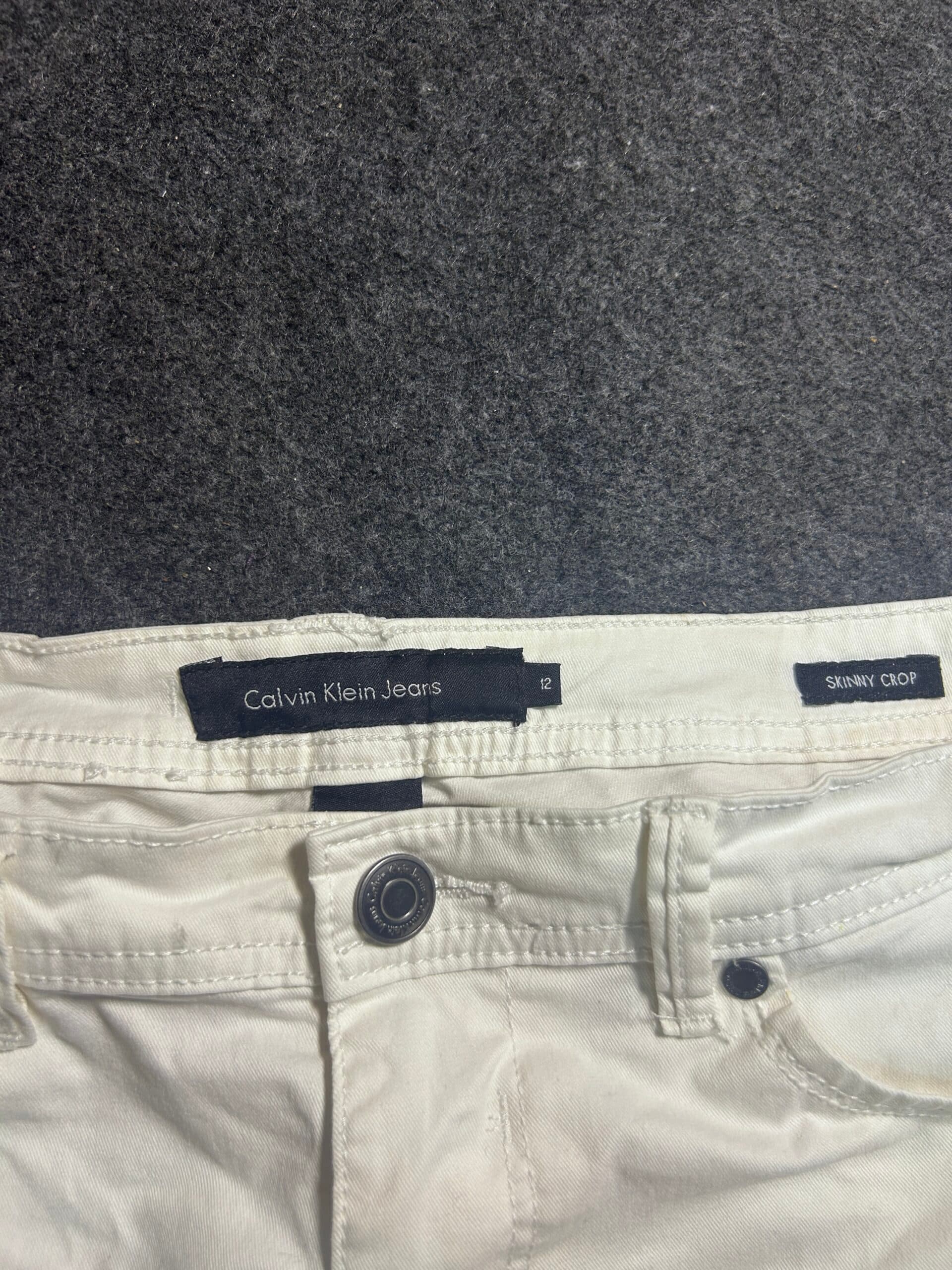 Calvin Klein thrift trousers India detail view