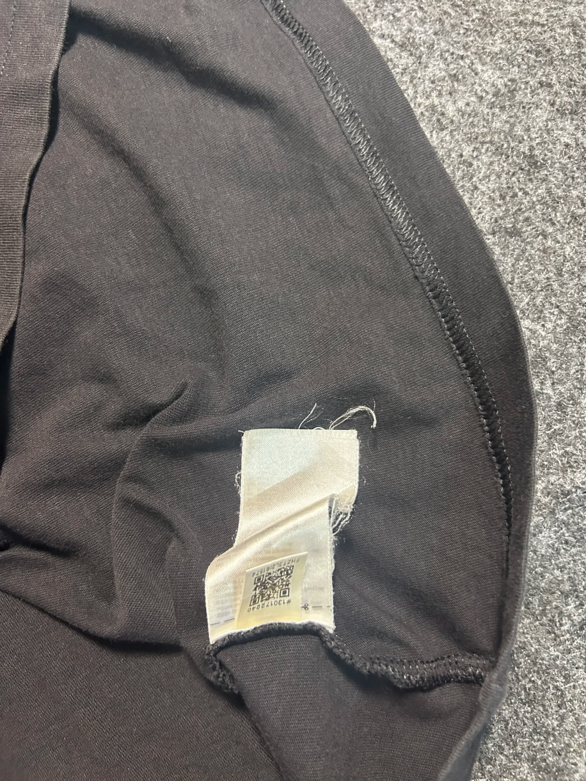 Adidas thrift t-shirt India close-up