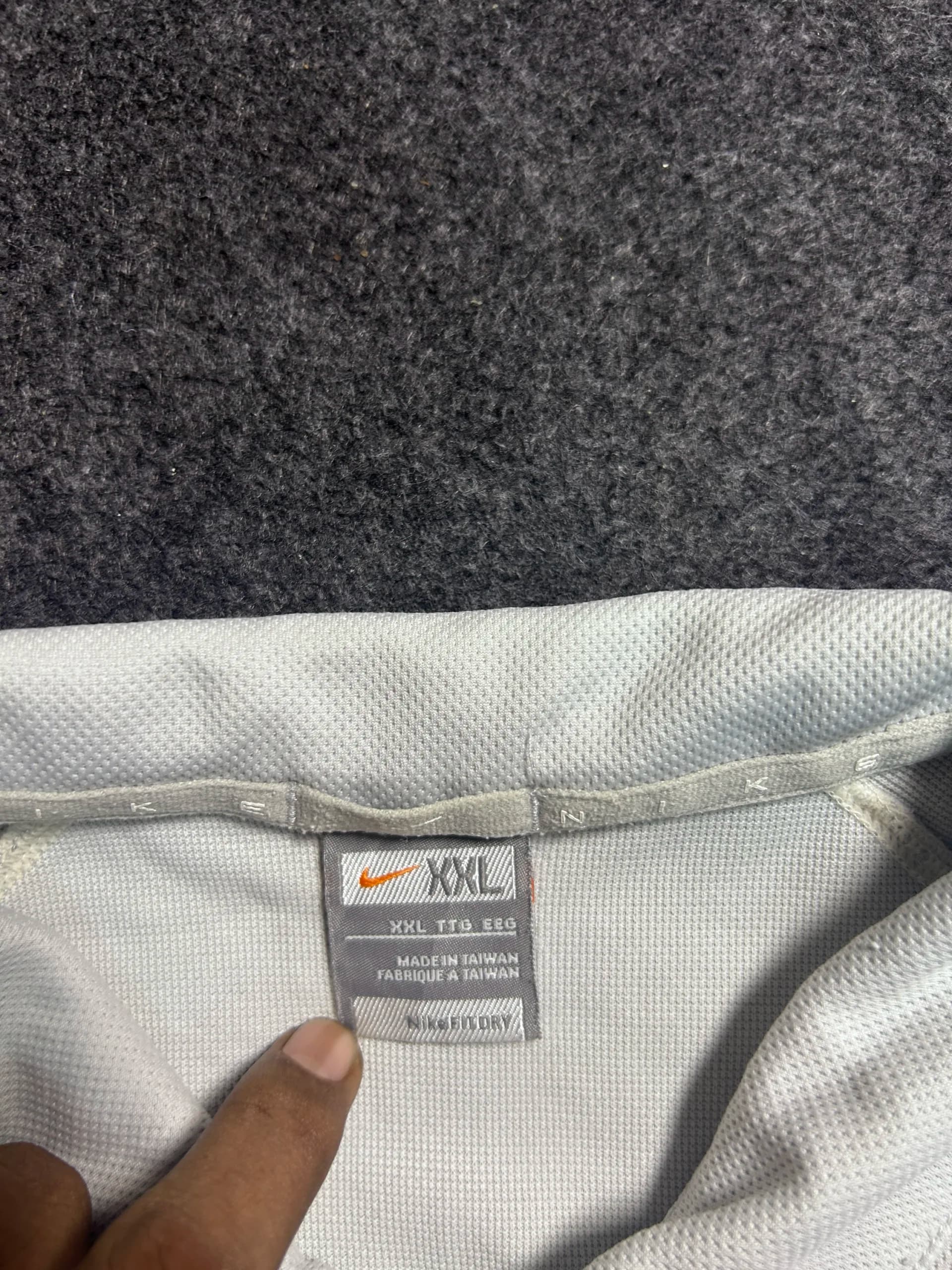 Nike thrift polo shirt India close-up