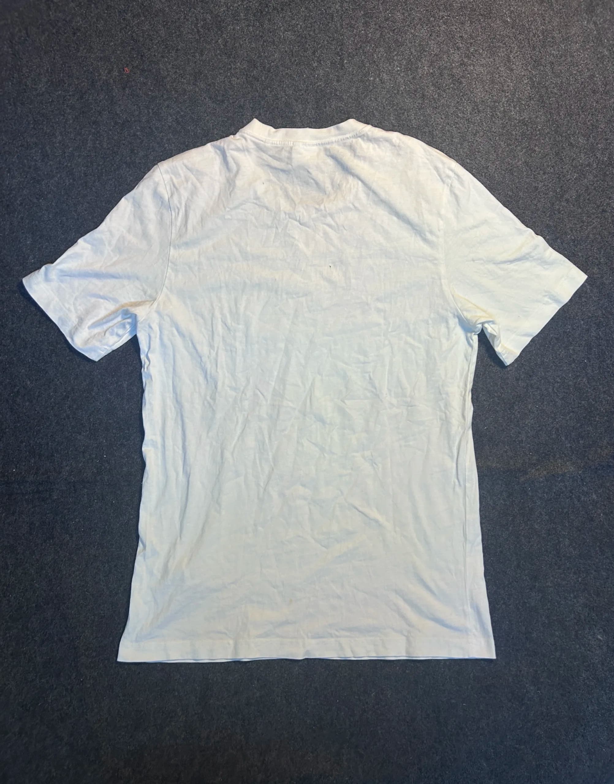 Adidas thrift t-shirt India close-up