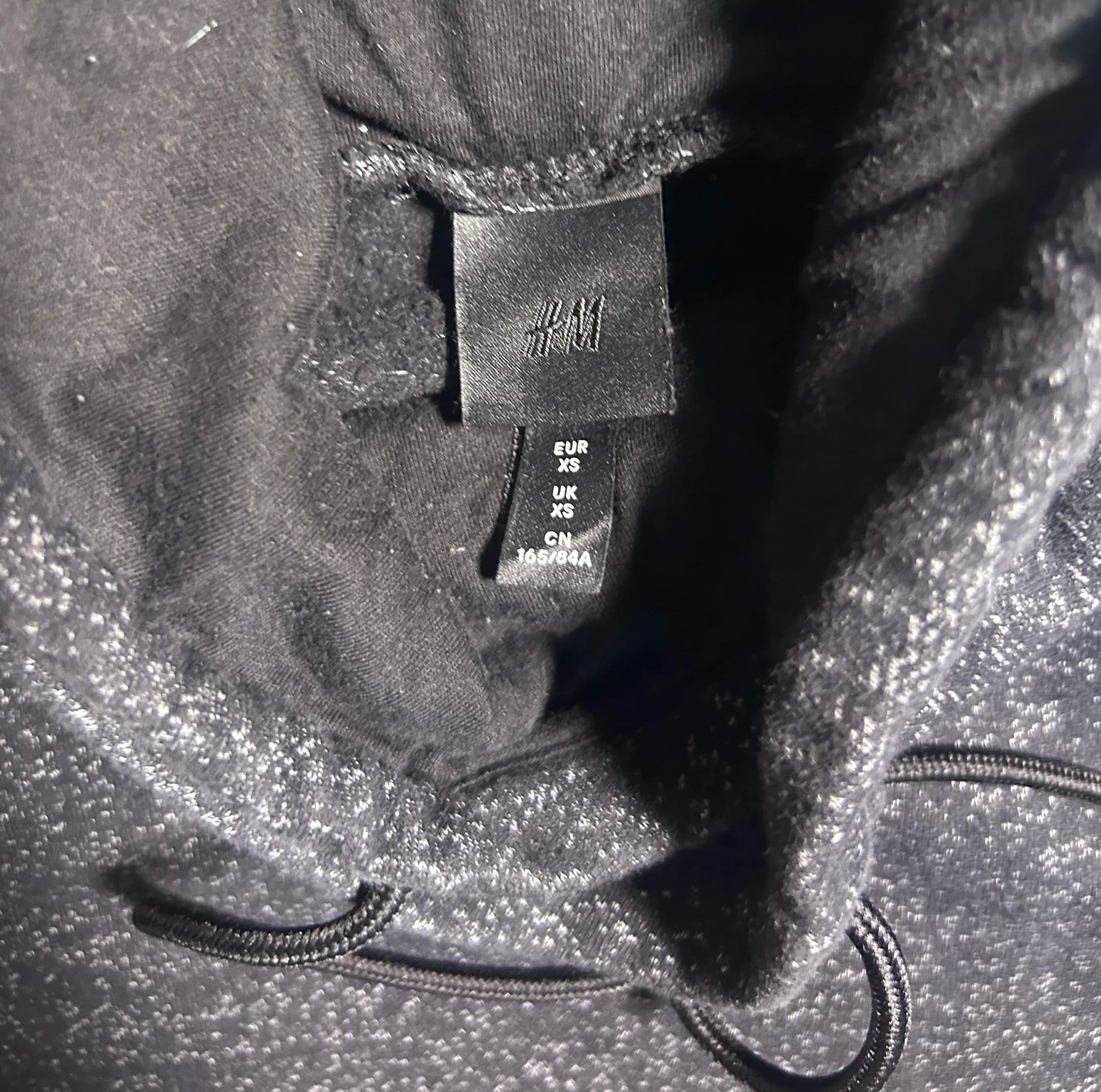 Branded thrift fleece jacket India close-up