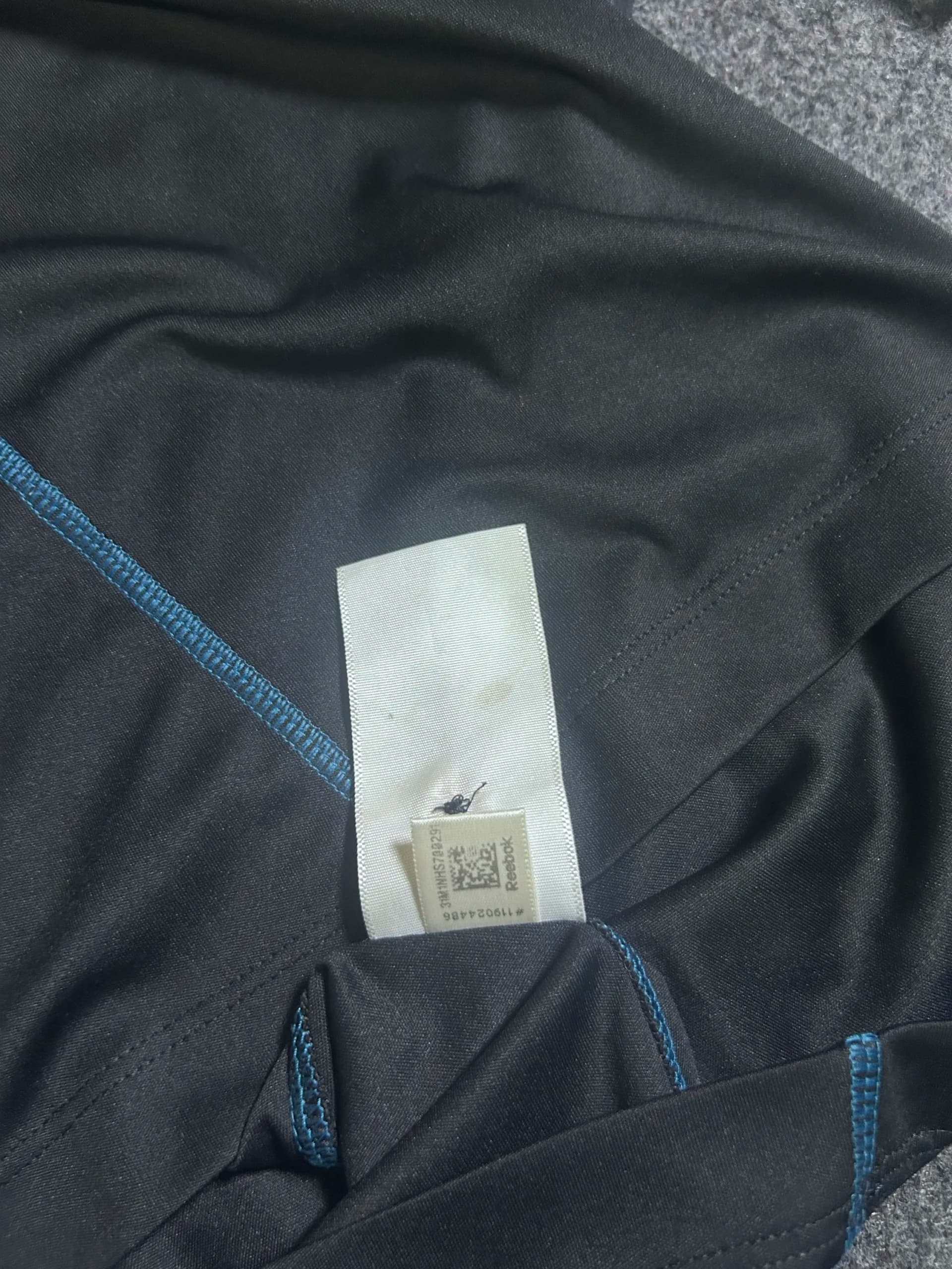 Reebok thrift polo shirt India close-up