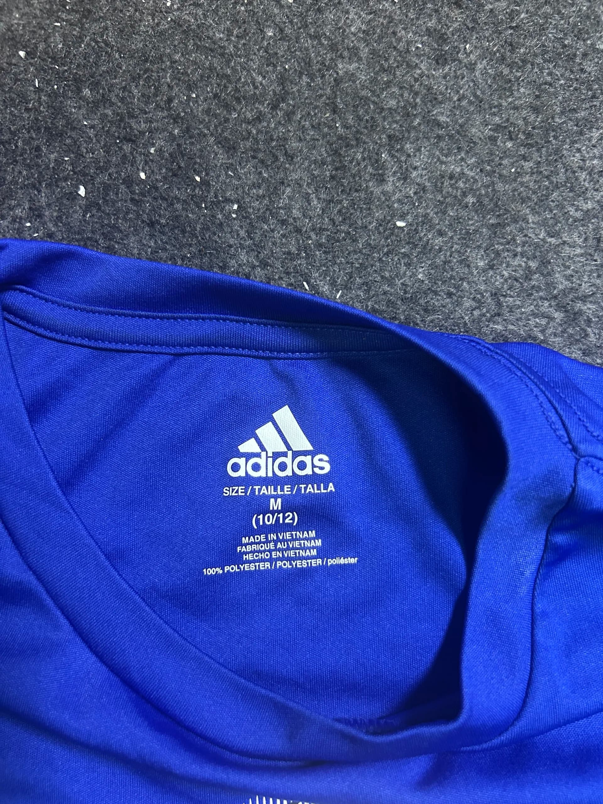 Adidas thrift t-shirt India close-up