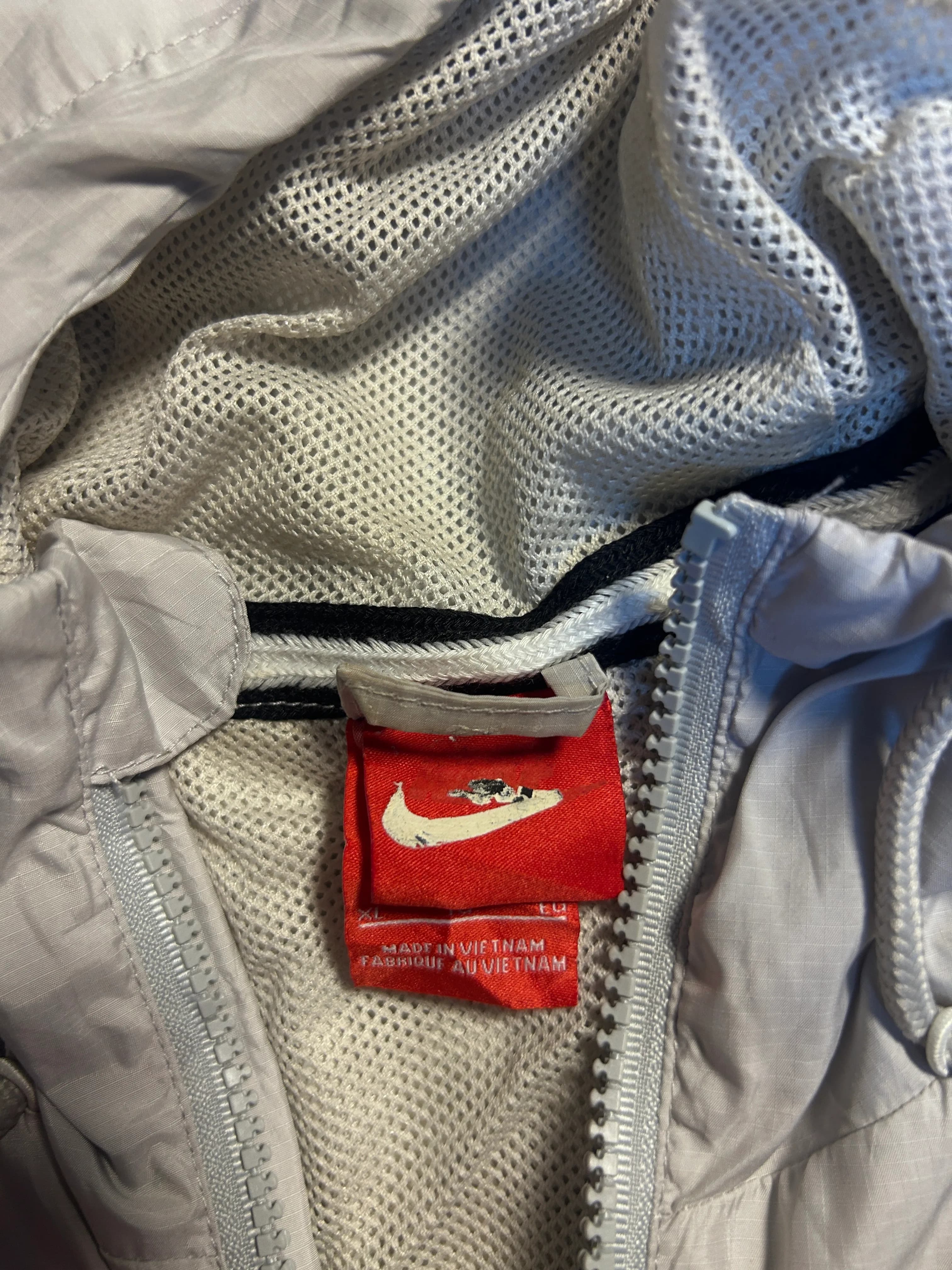 Nike thrift windbreaker jacket India close-up