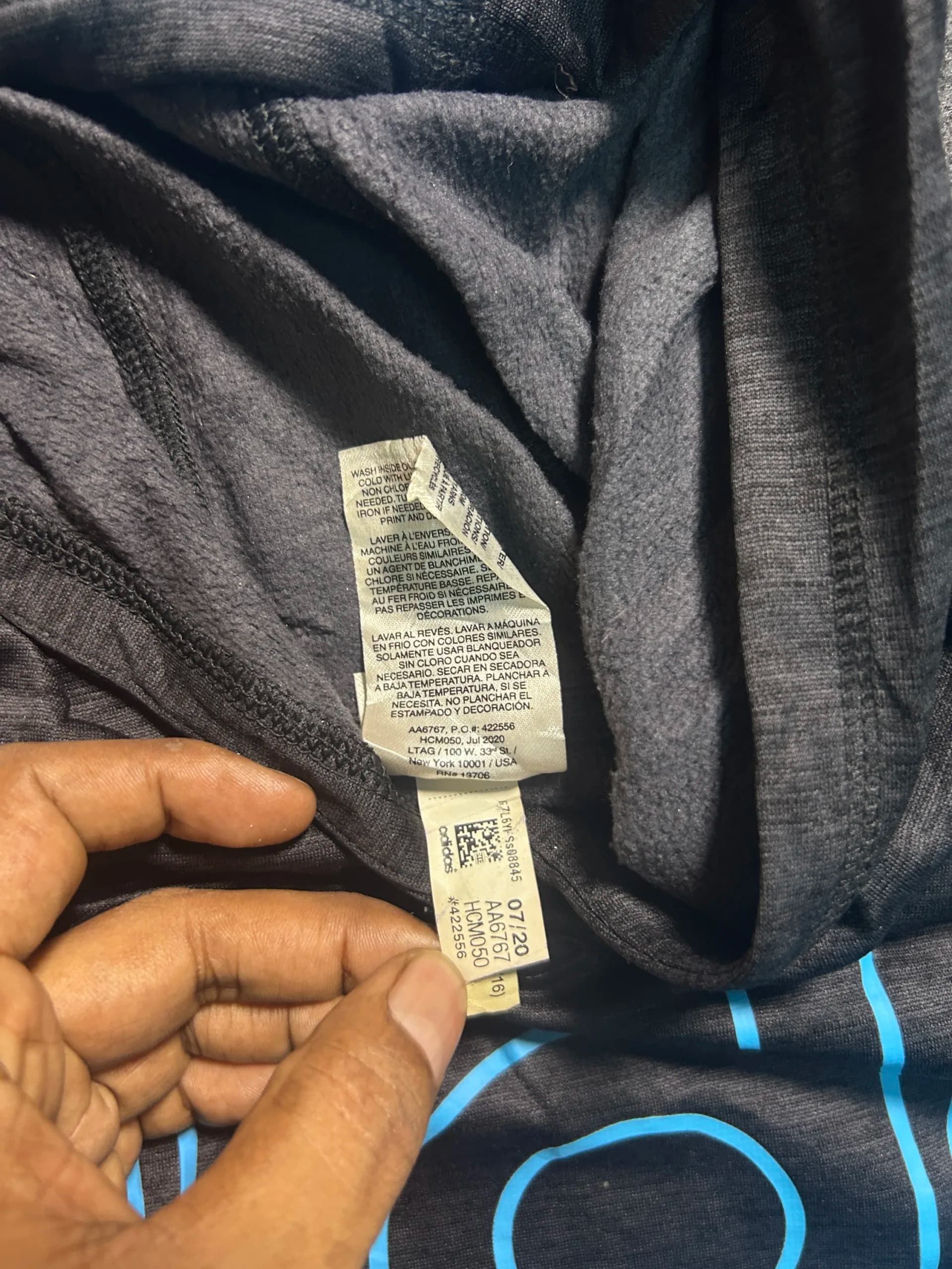 Adidas thrift hoodie India close-up