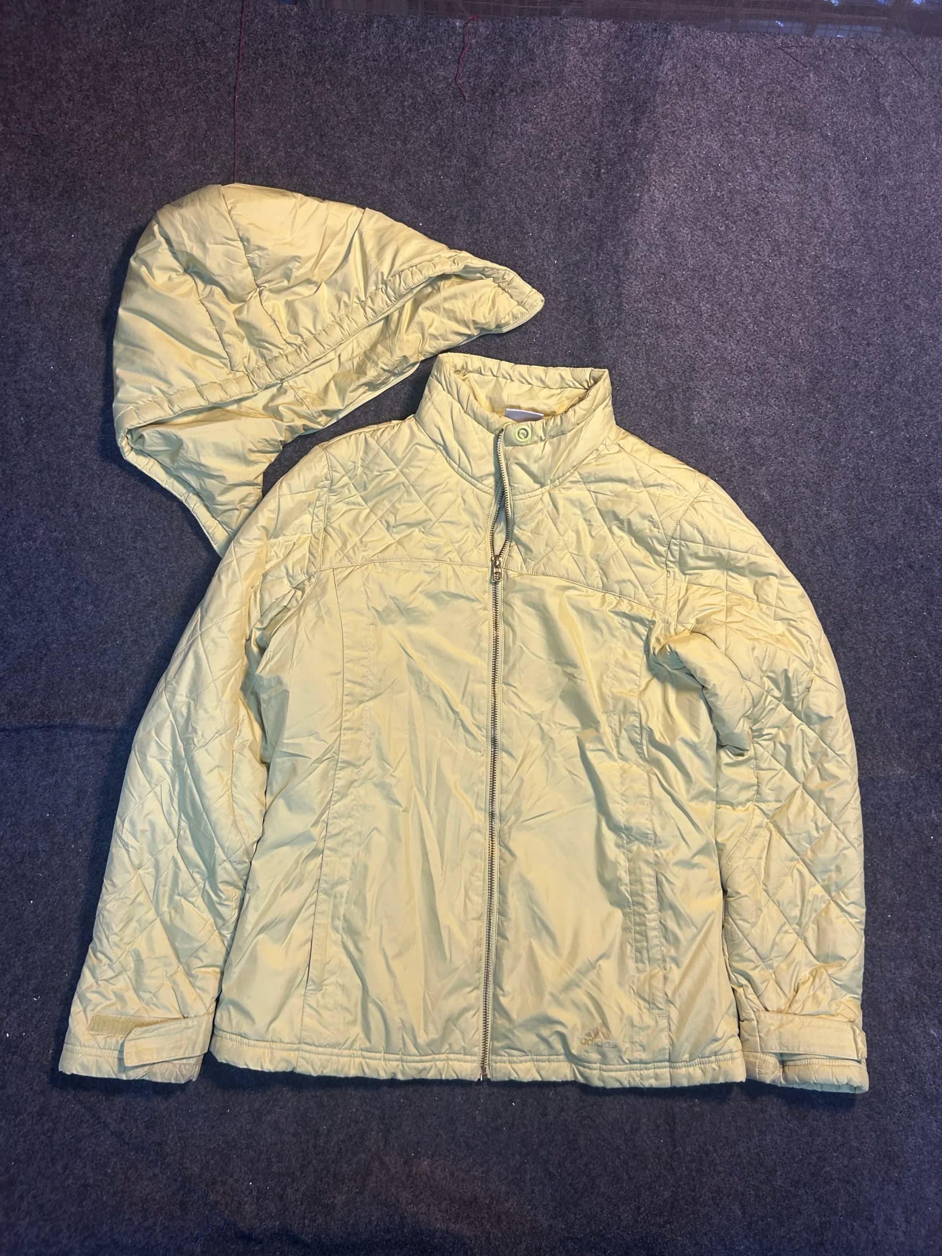 Adidas thrift puffer jacket India close-up