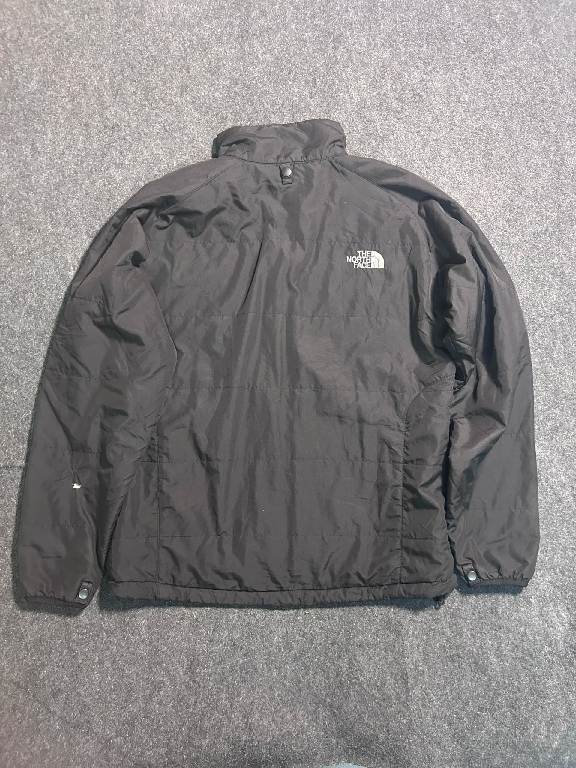 The North Face thrift waterproof jacket India detail view