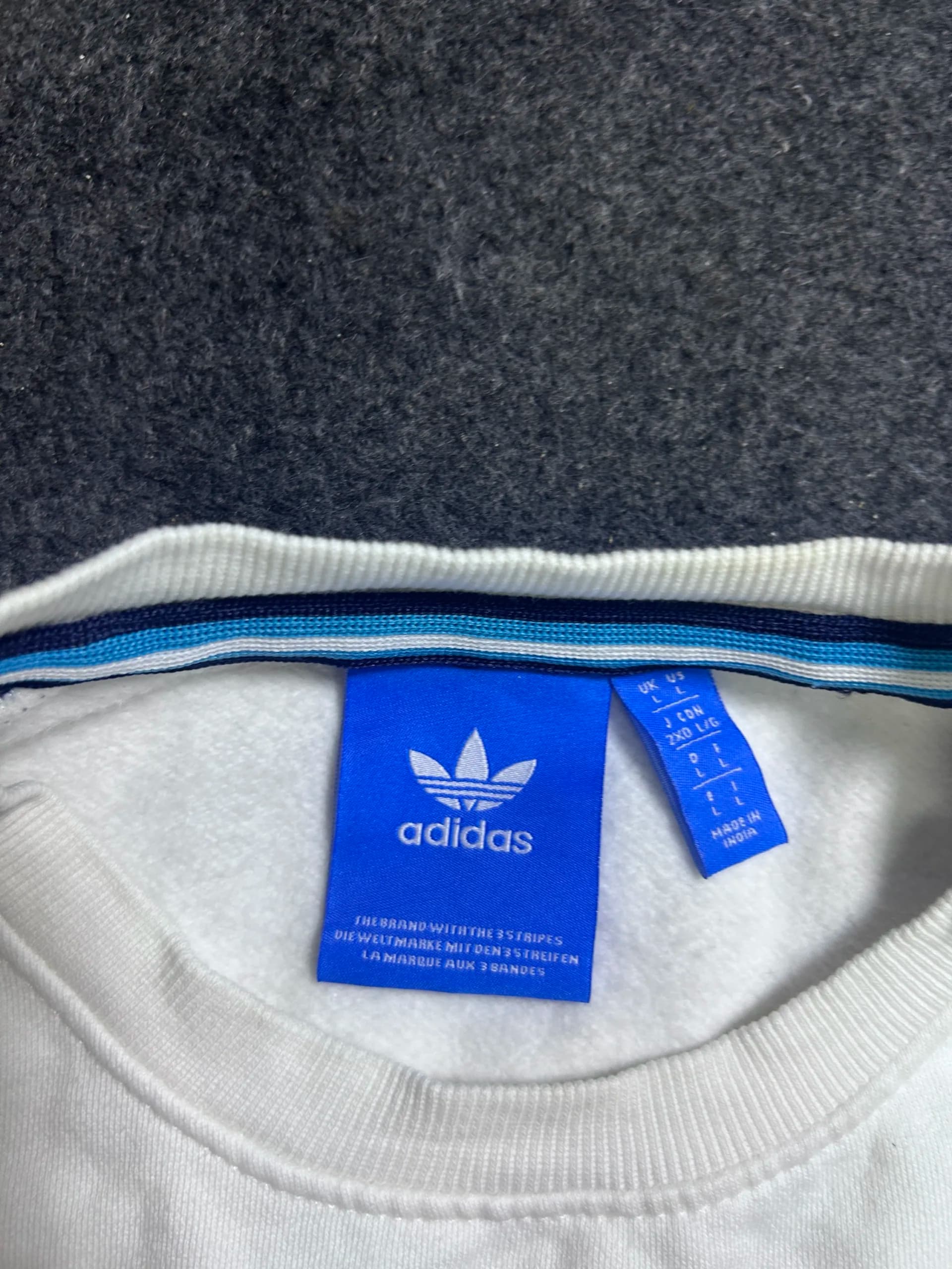 Adidas thrift sweatshirt India close-up