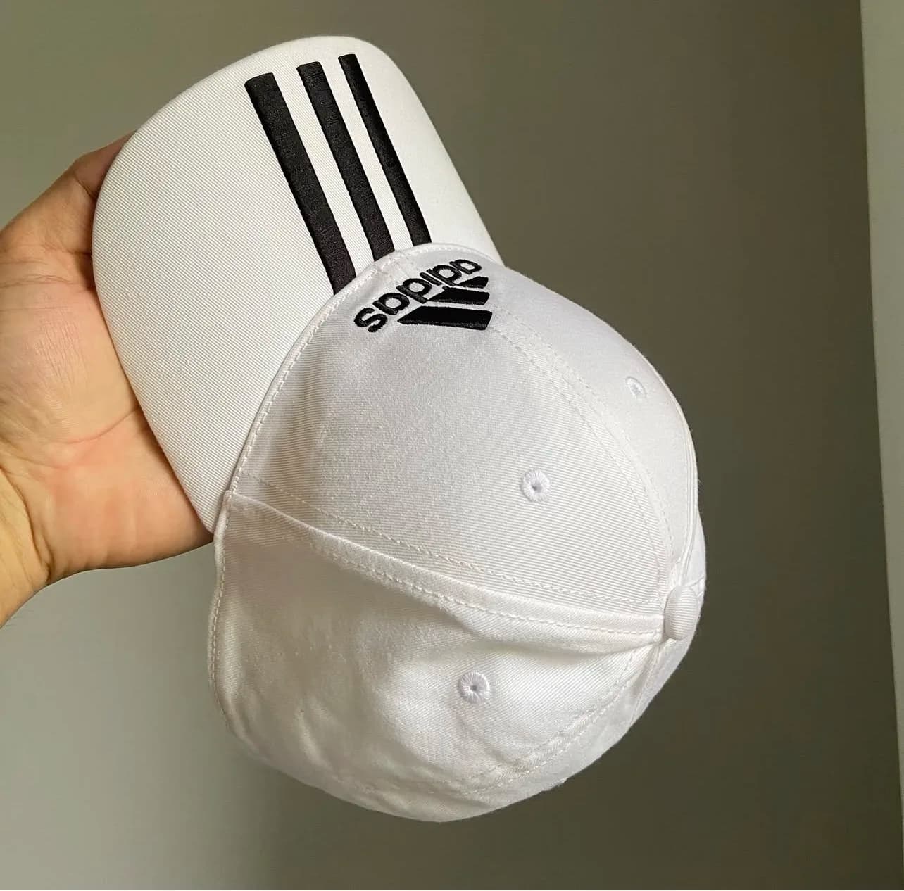 Adidas thrift clothing India close-up