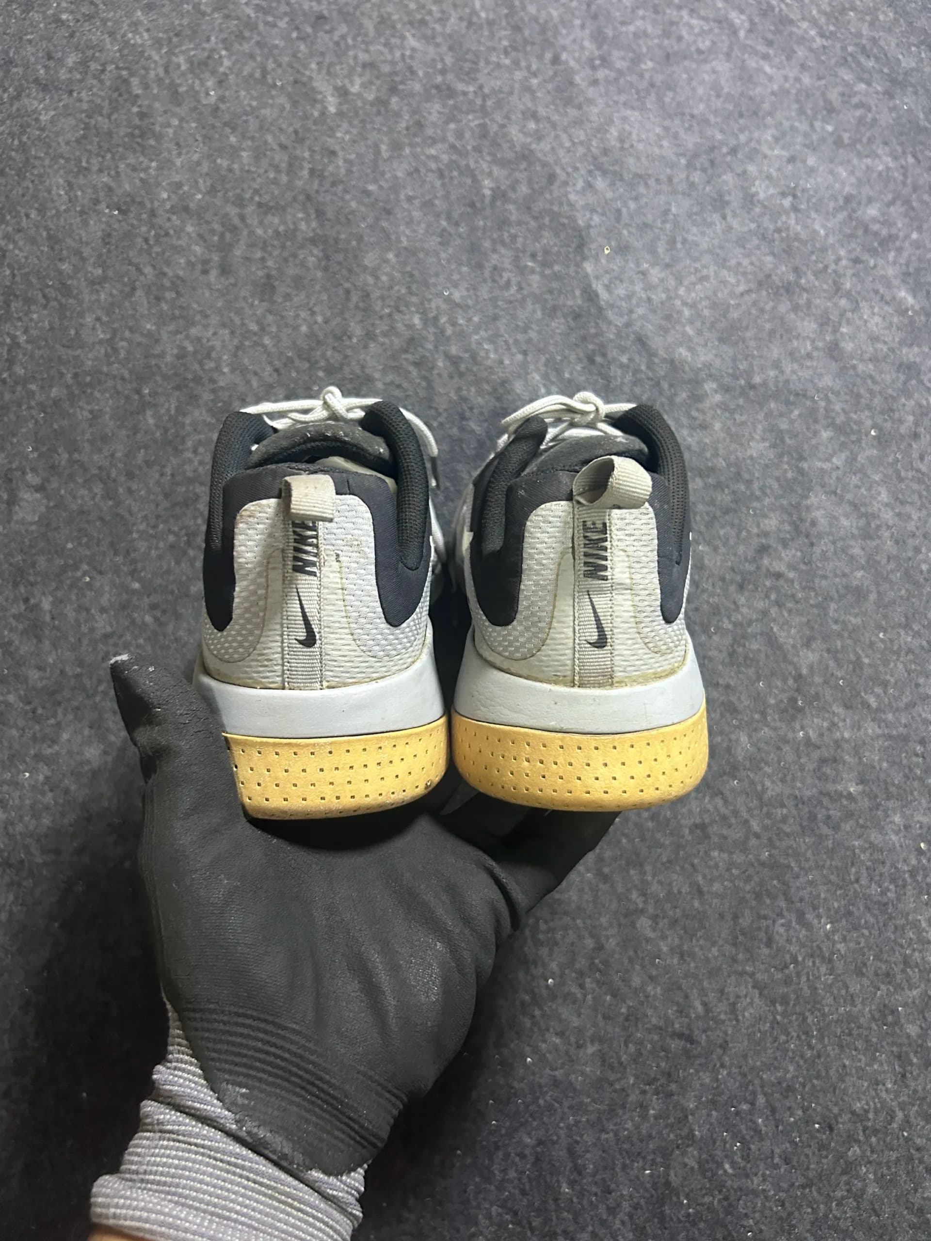 Nike thrift sneakers India close-up
