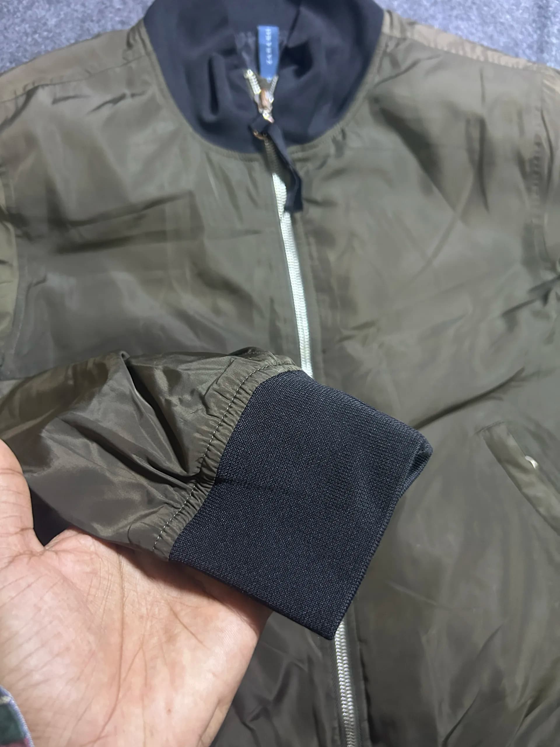Zara thrift bomber jacket India close-up