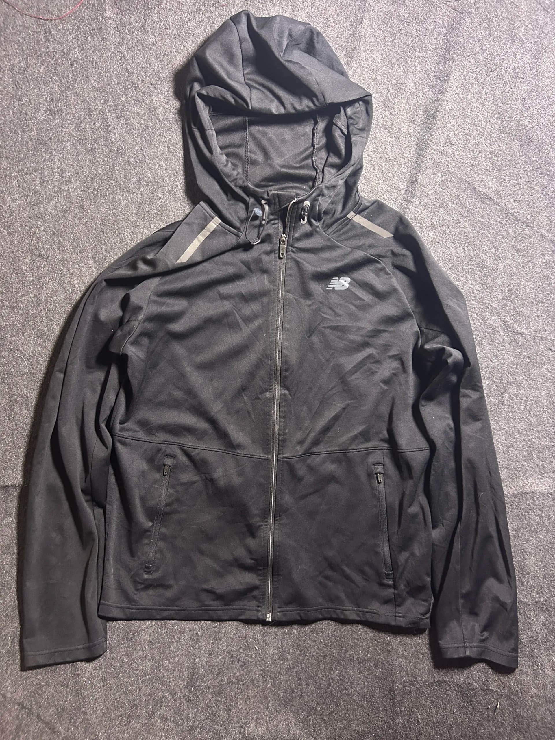New Balance thrift softshell jacket India back view