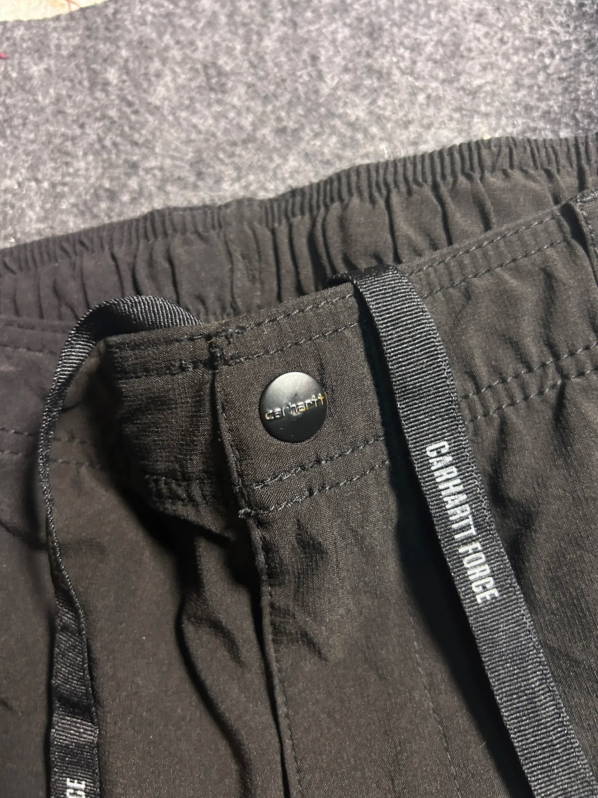Carhartt thrift track pants India detail view