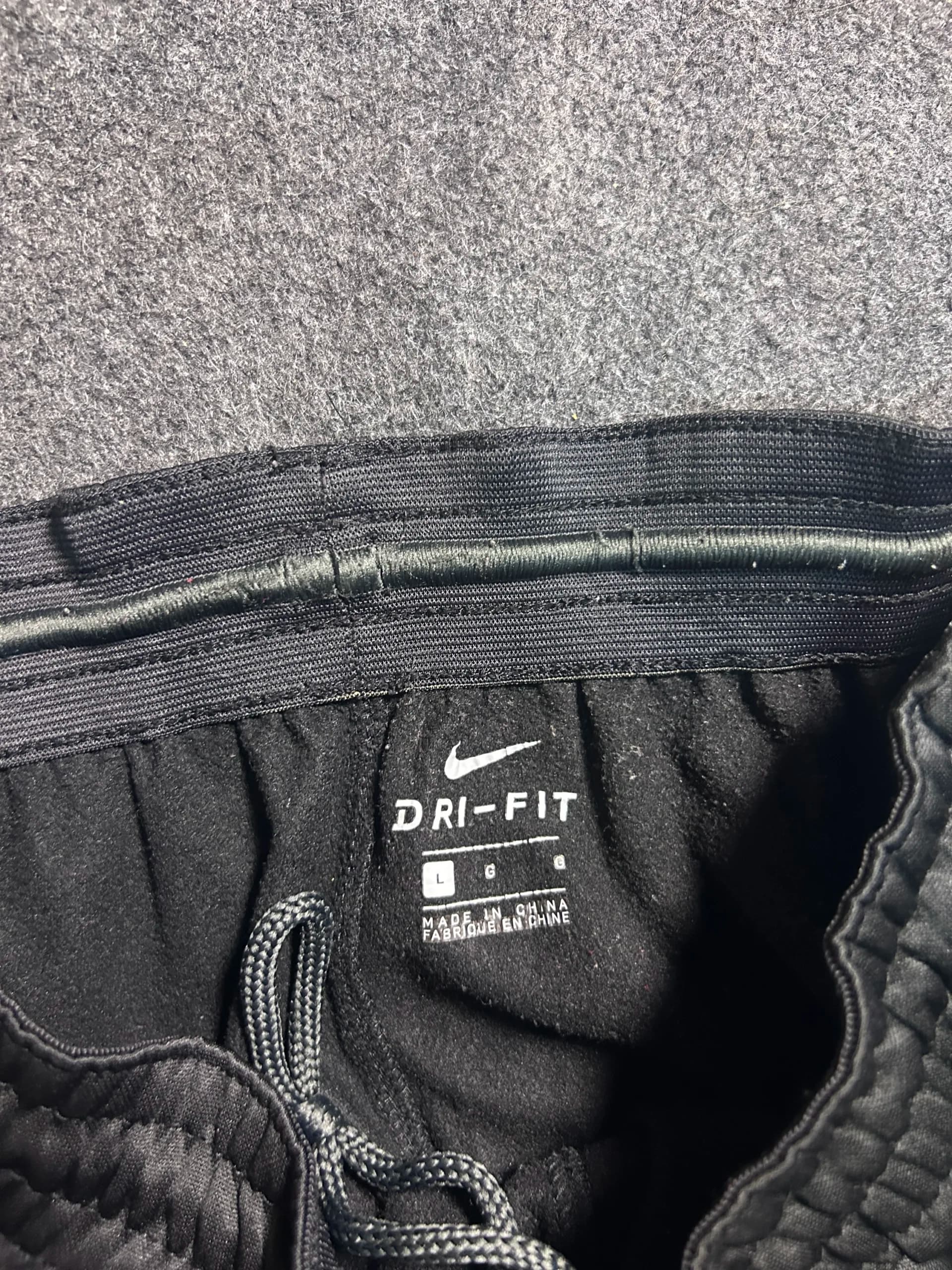 Nike Dri-FIT thrift track pants India close-up