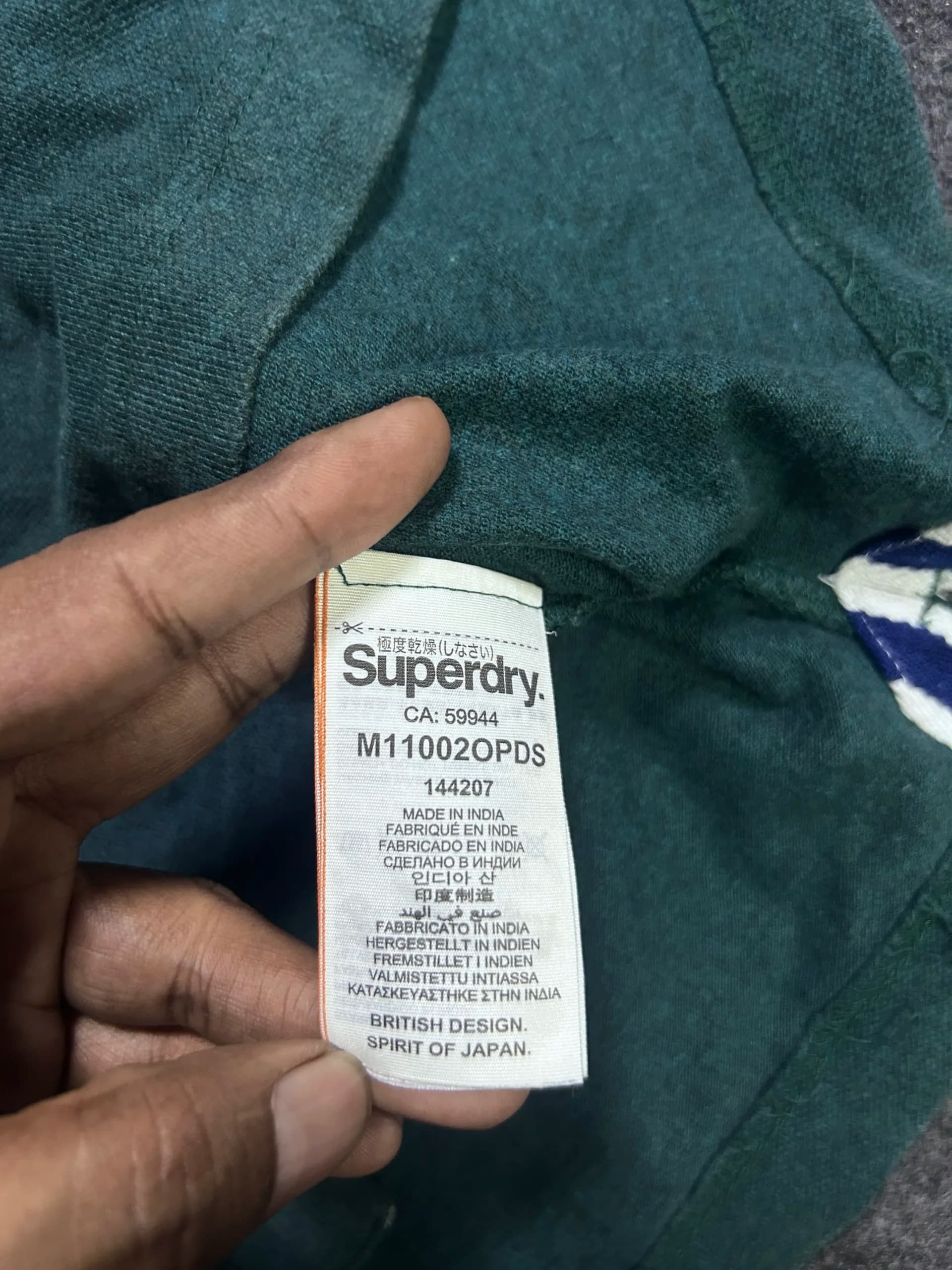 Superdry thrift polo shirt India close-up