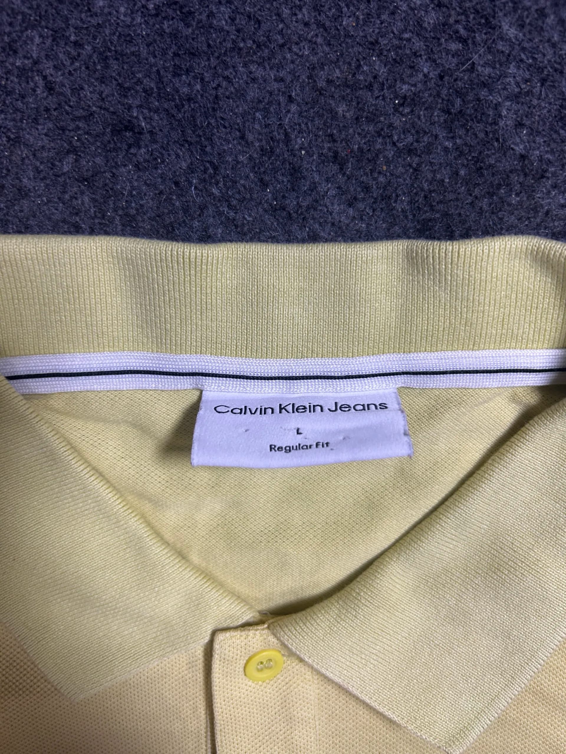 Calvin Klein thrift jeans India close-up