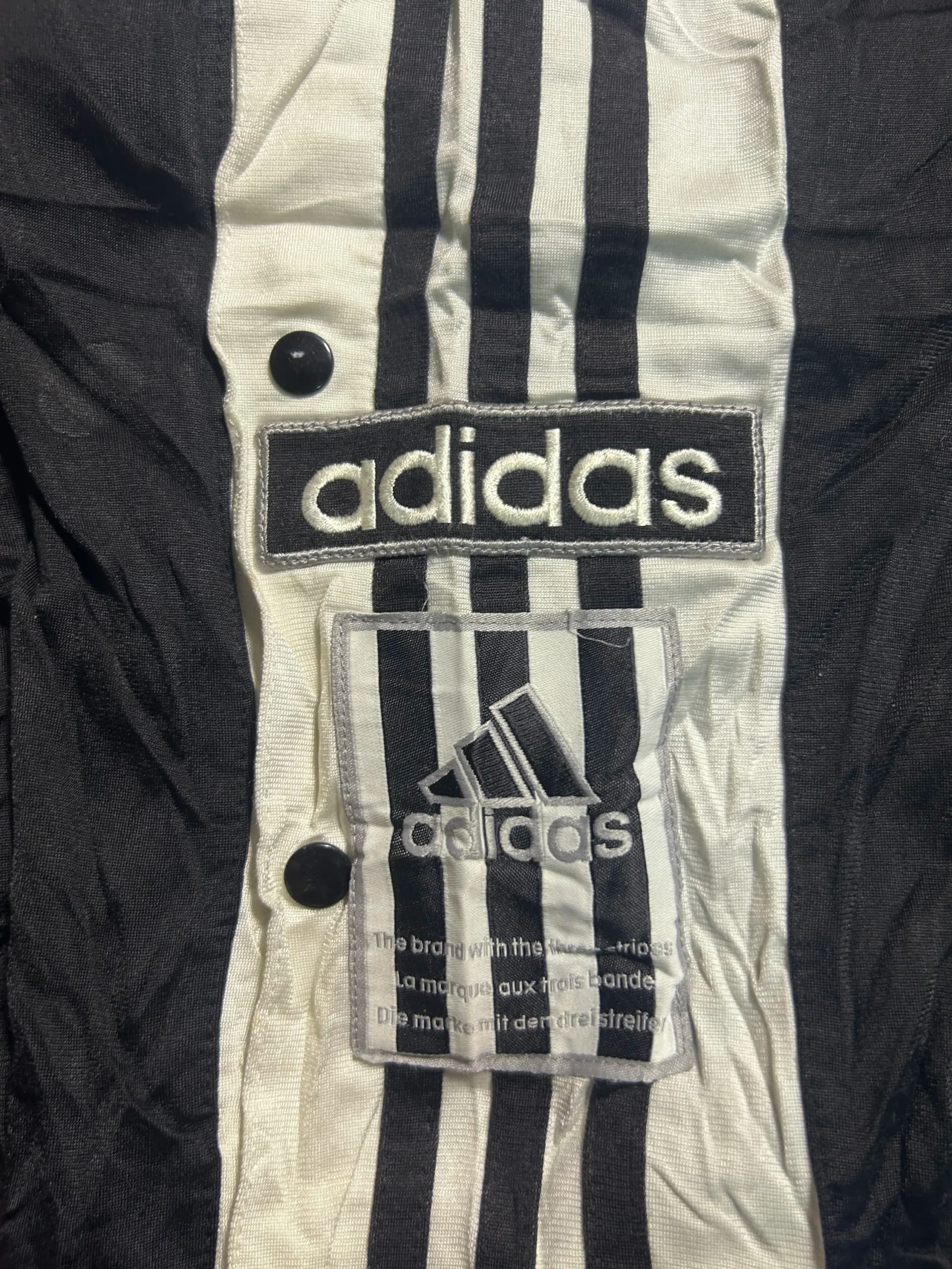 Adidas thrift track pants India close-up