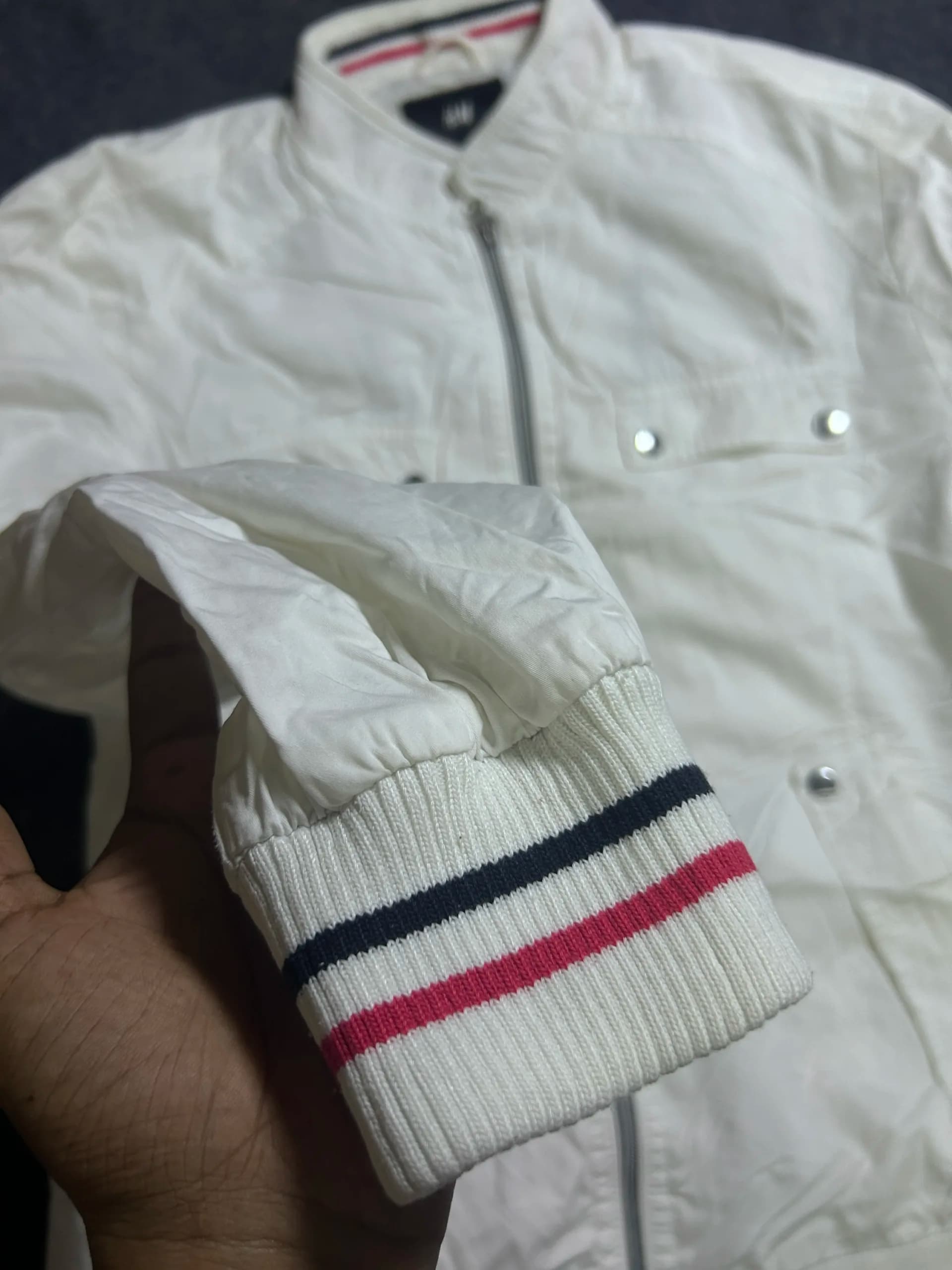 Branded thrift bomber jacket India close-up