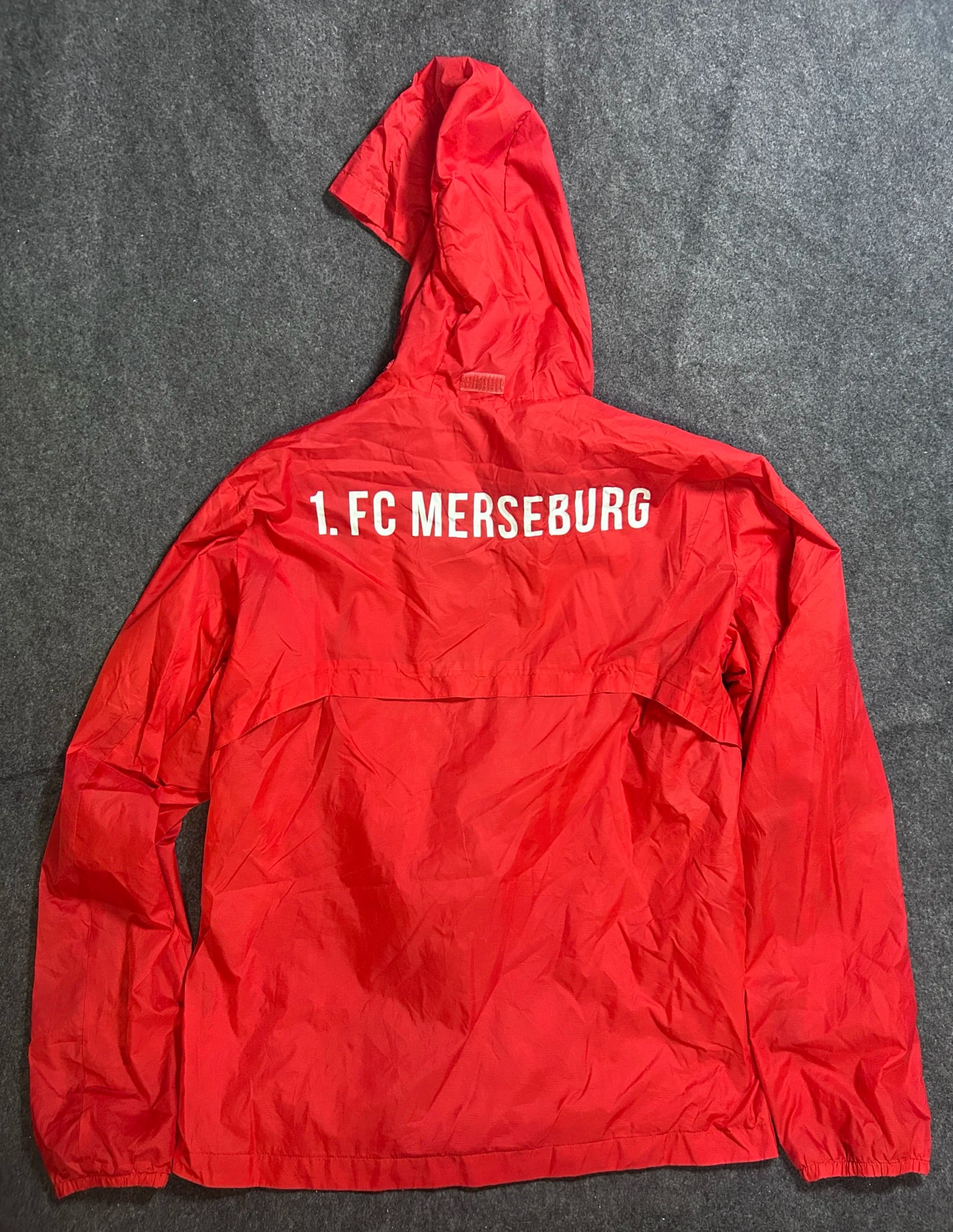 Puma thrift waterproof jacket India back view