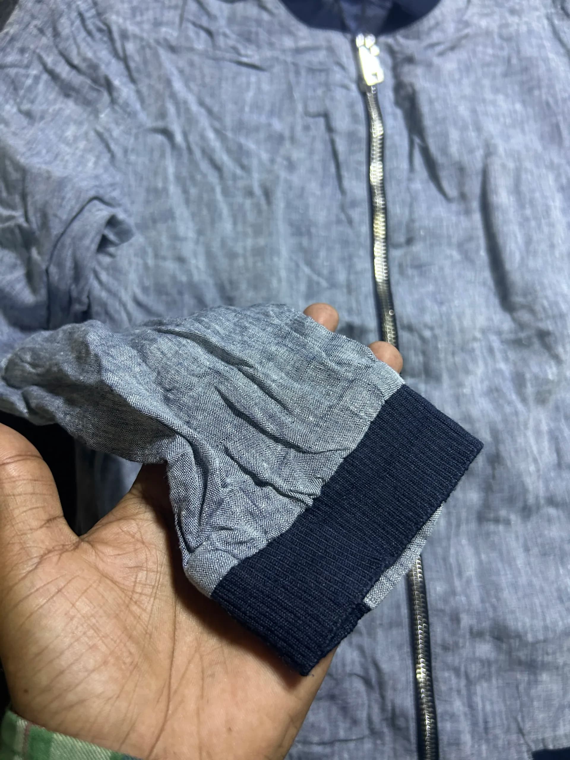 Branded thrift bomber jacket India close-up