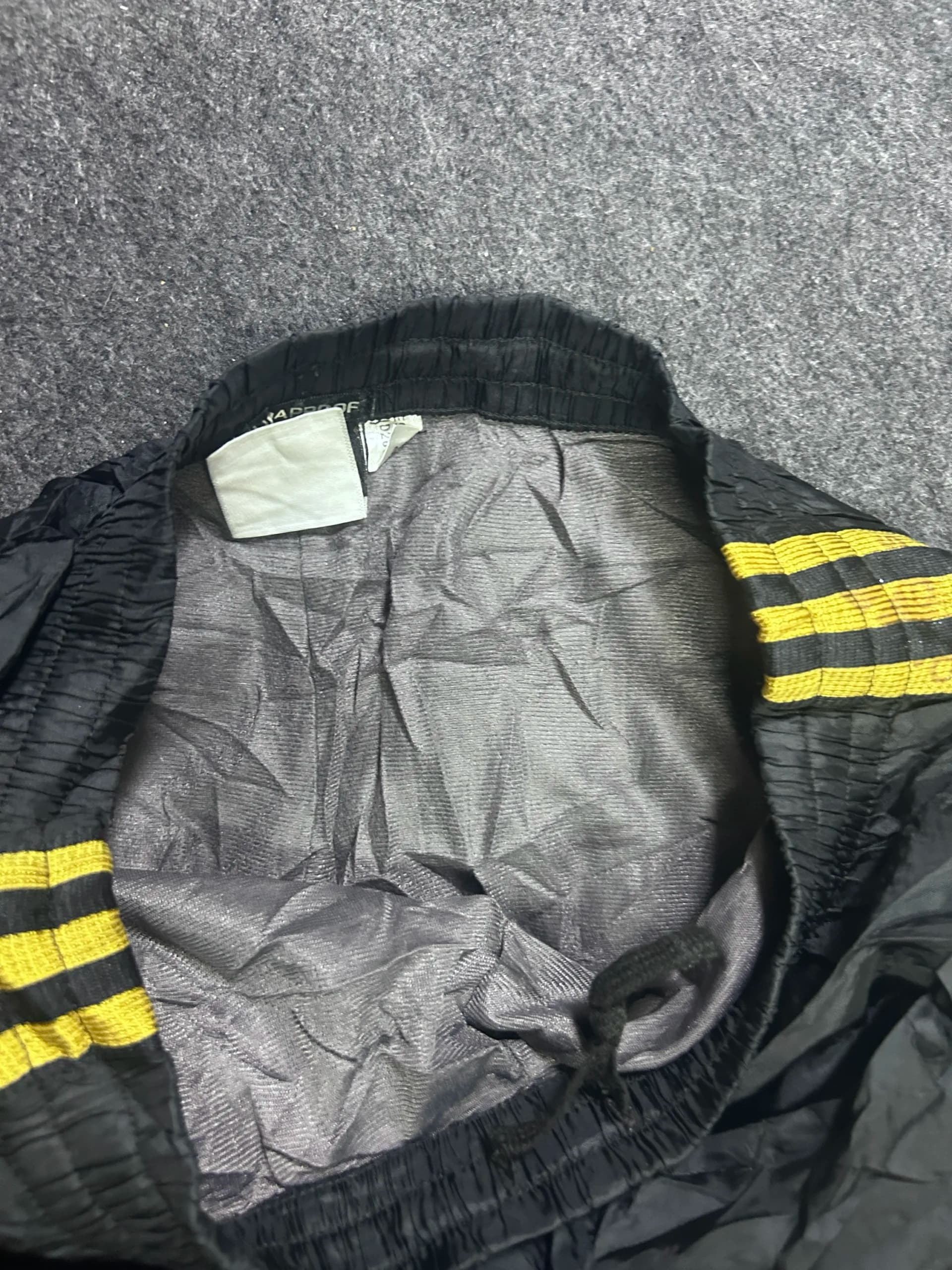 Adidas thrift shorts India close-up